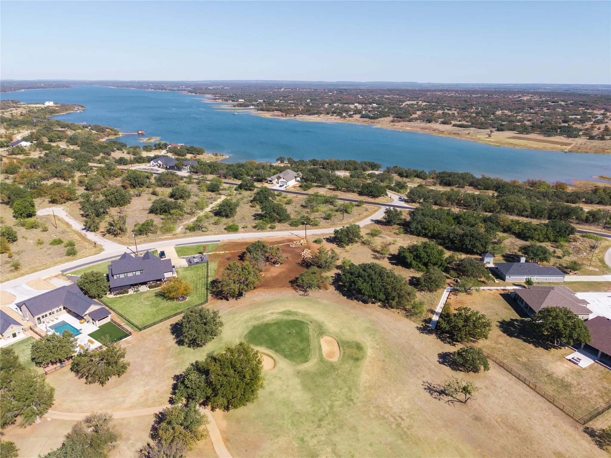 Aerial overview of property on the 4th green of Hideout Golf Course and close proximity to Lake Brownwood