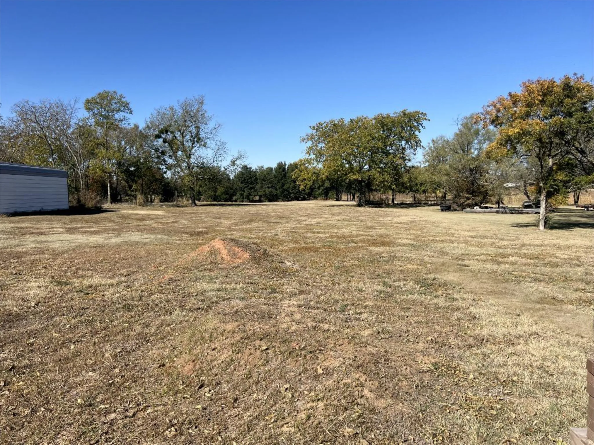 View of yard with a view of countryside