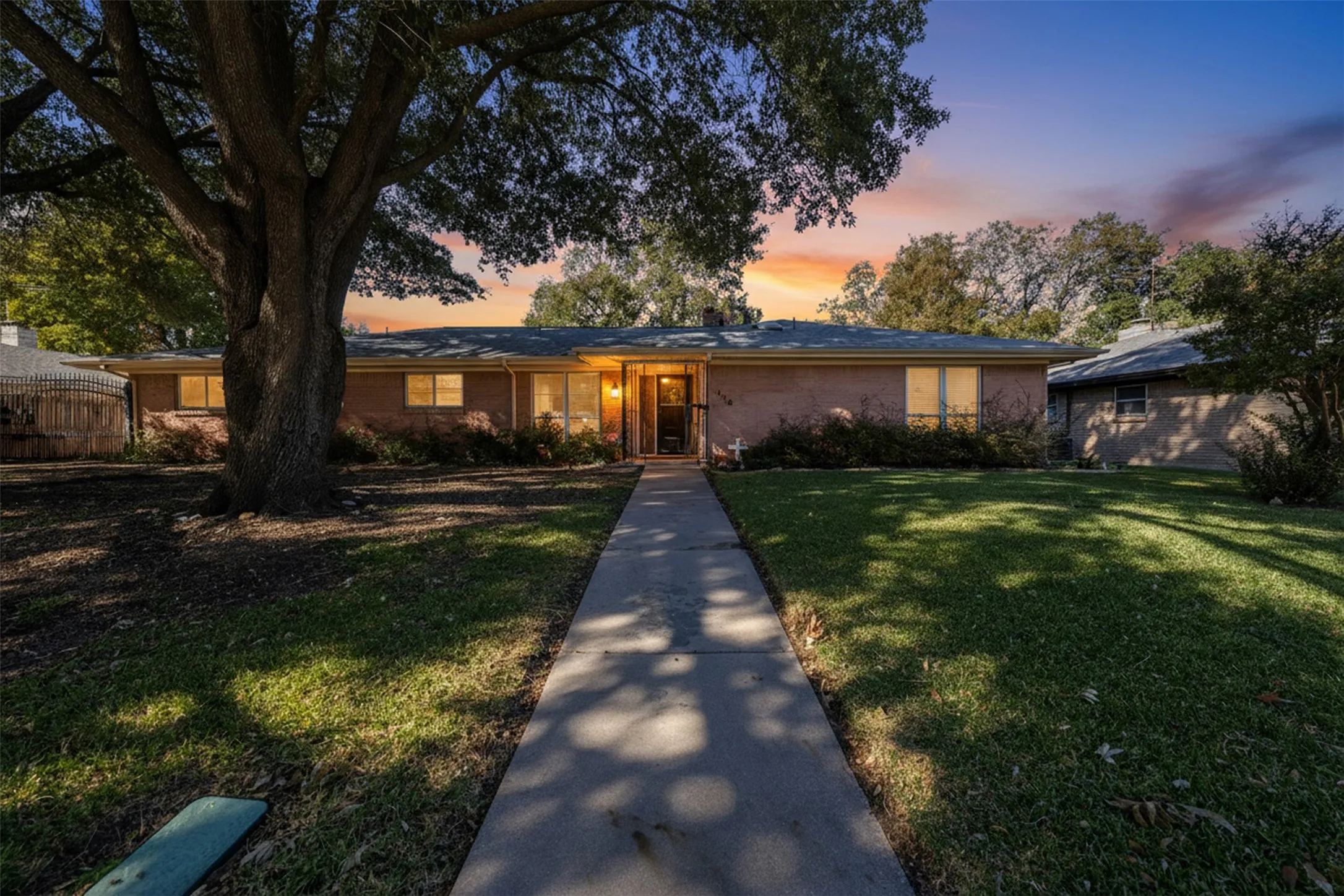 View of front of property featuring a yard