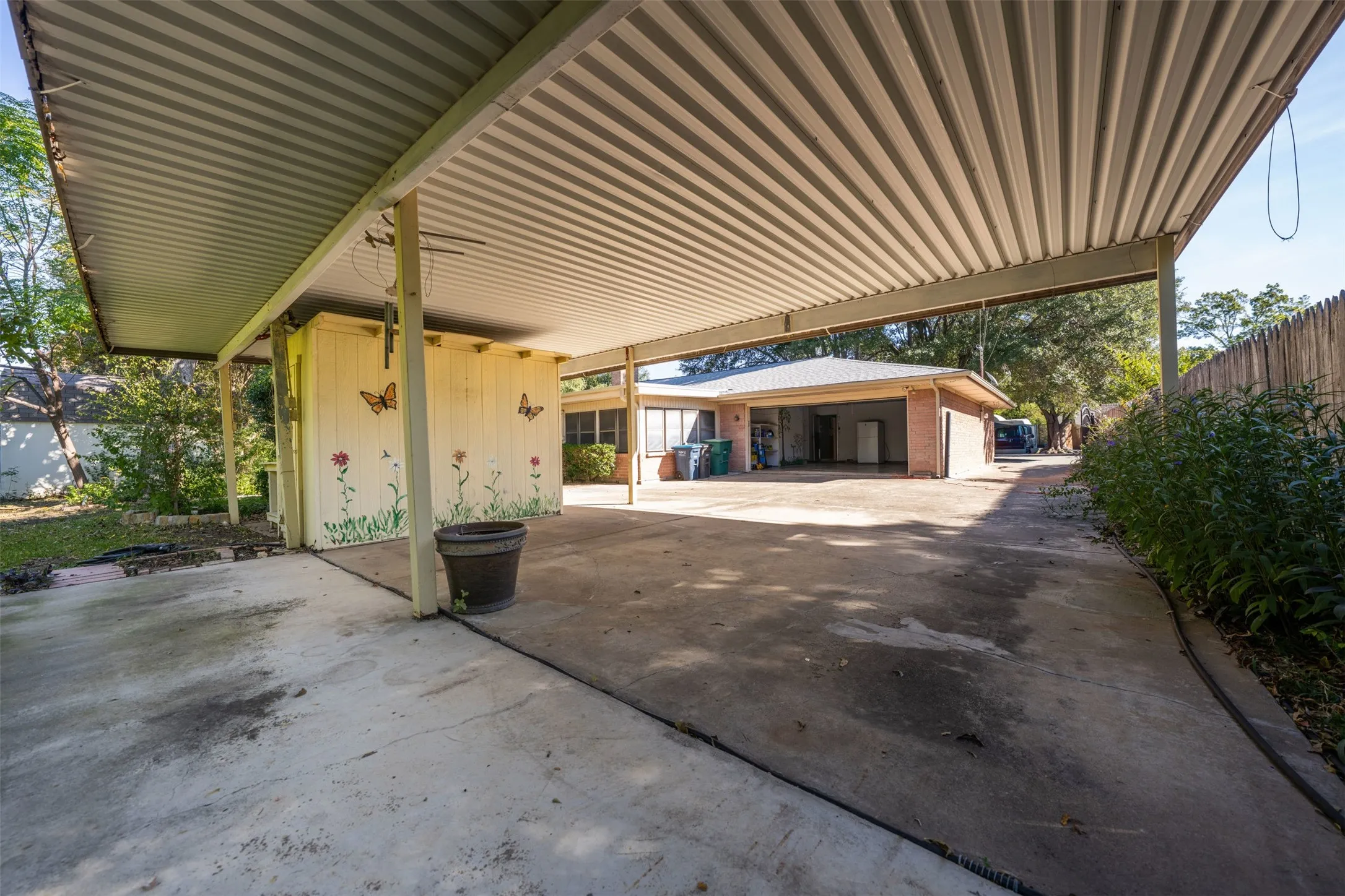 View of patio / terrace featuring a carport