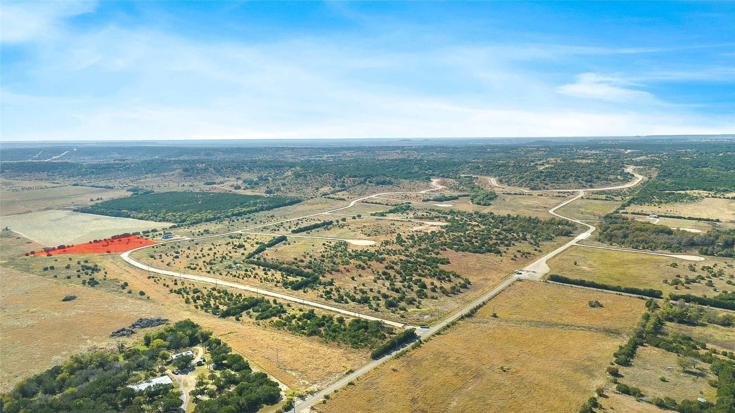 Aerial view of property and surrounding area featuring rural landscape
