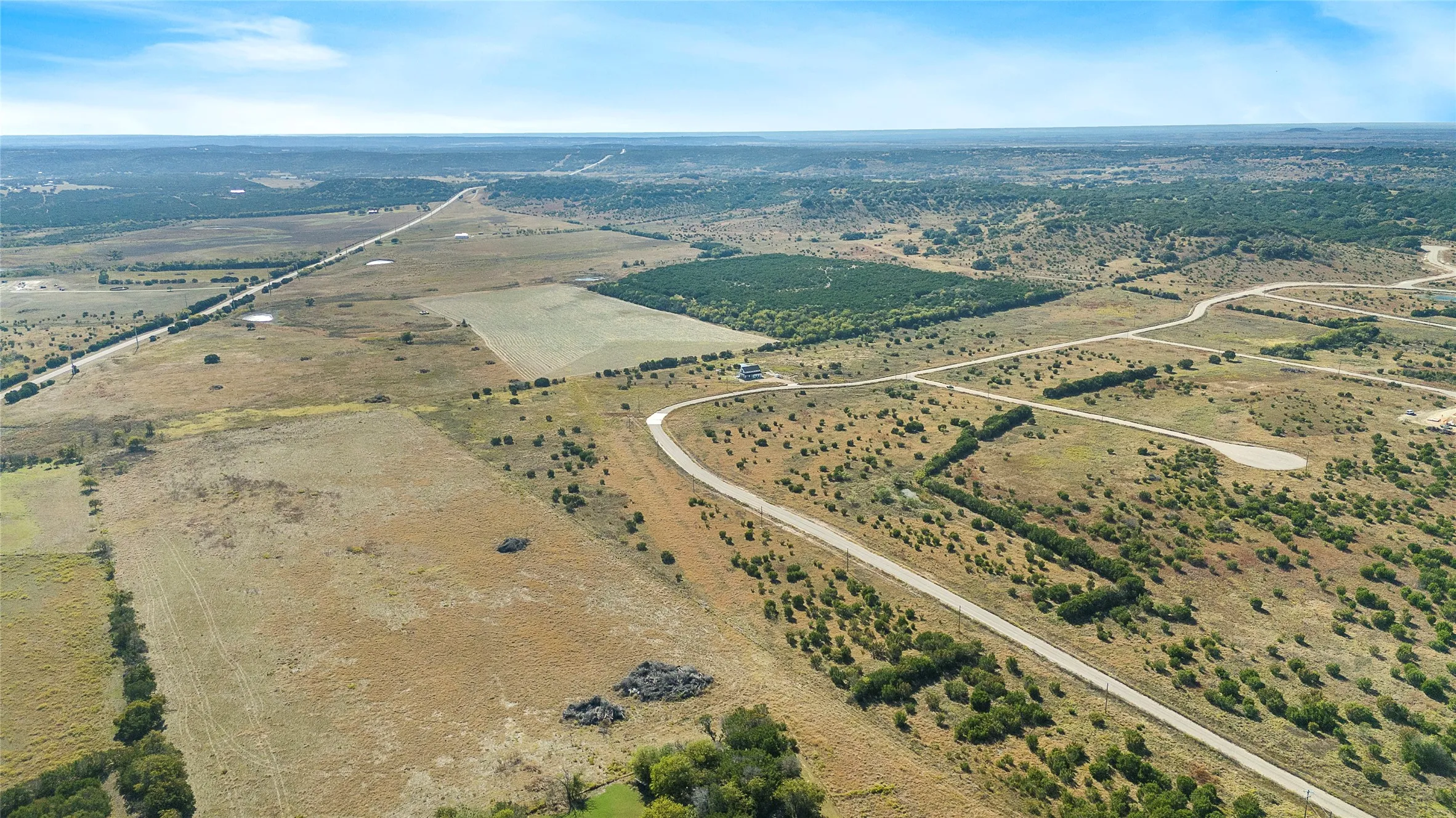 Aerial view of property's location with rural landscape