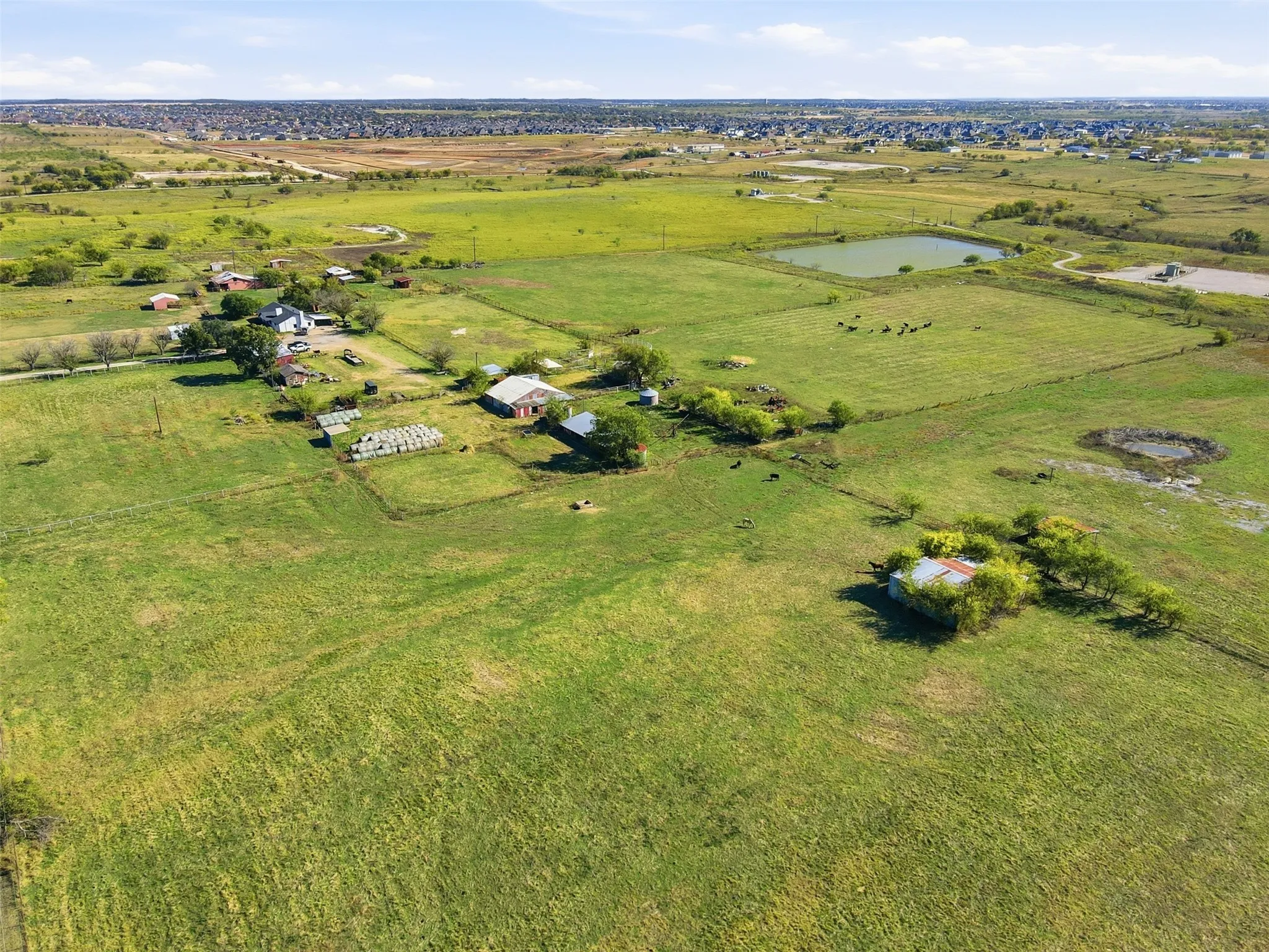 VIEW OF PROPERTY FROM THE WEST LOOKING EAST