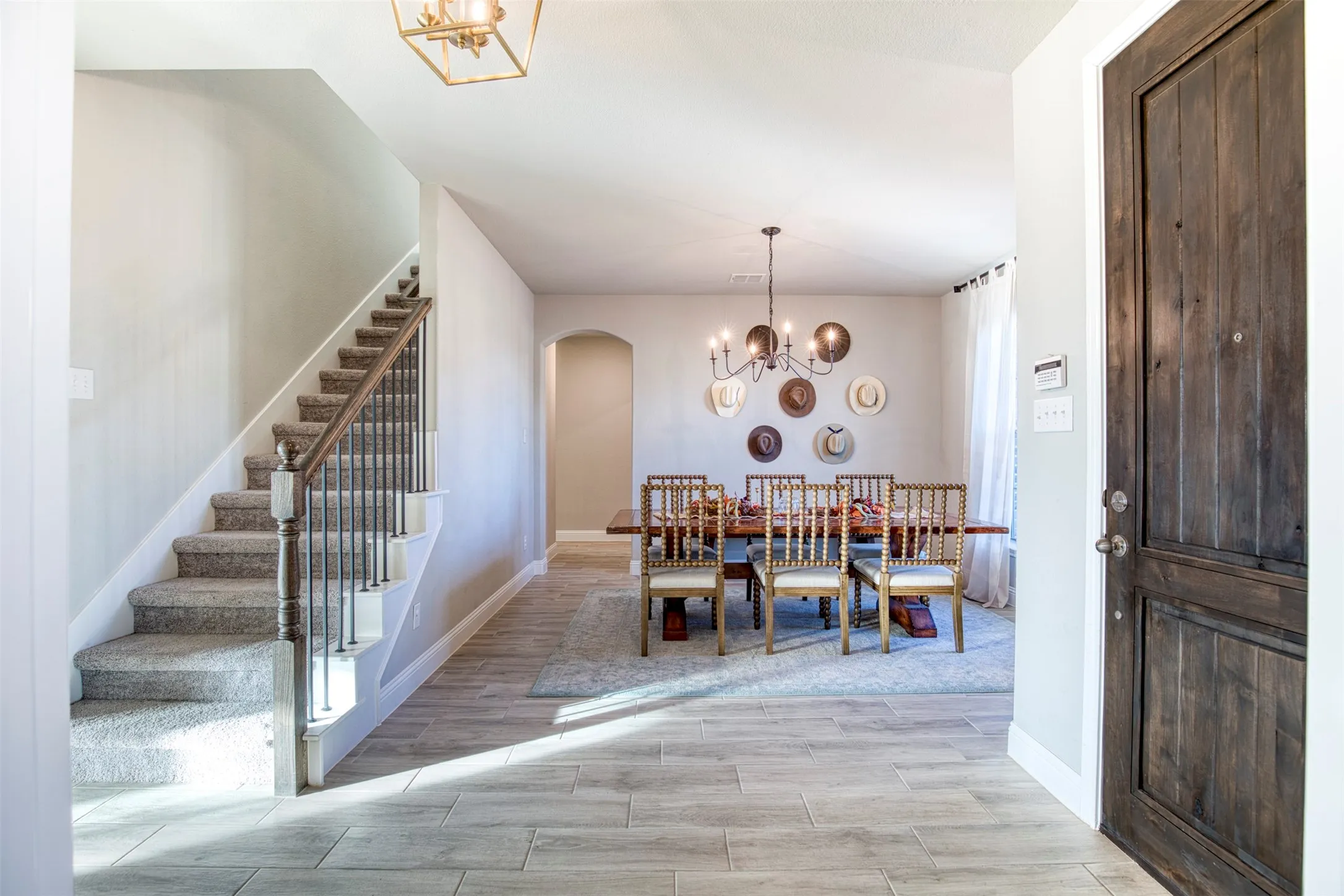 Open-concept entry with luxury vinyl plank flooring.