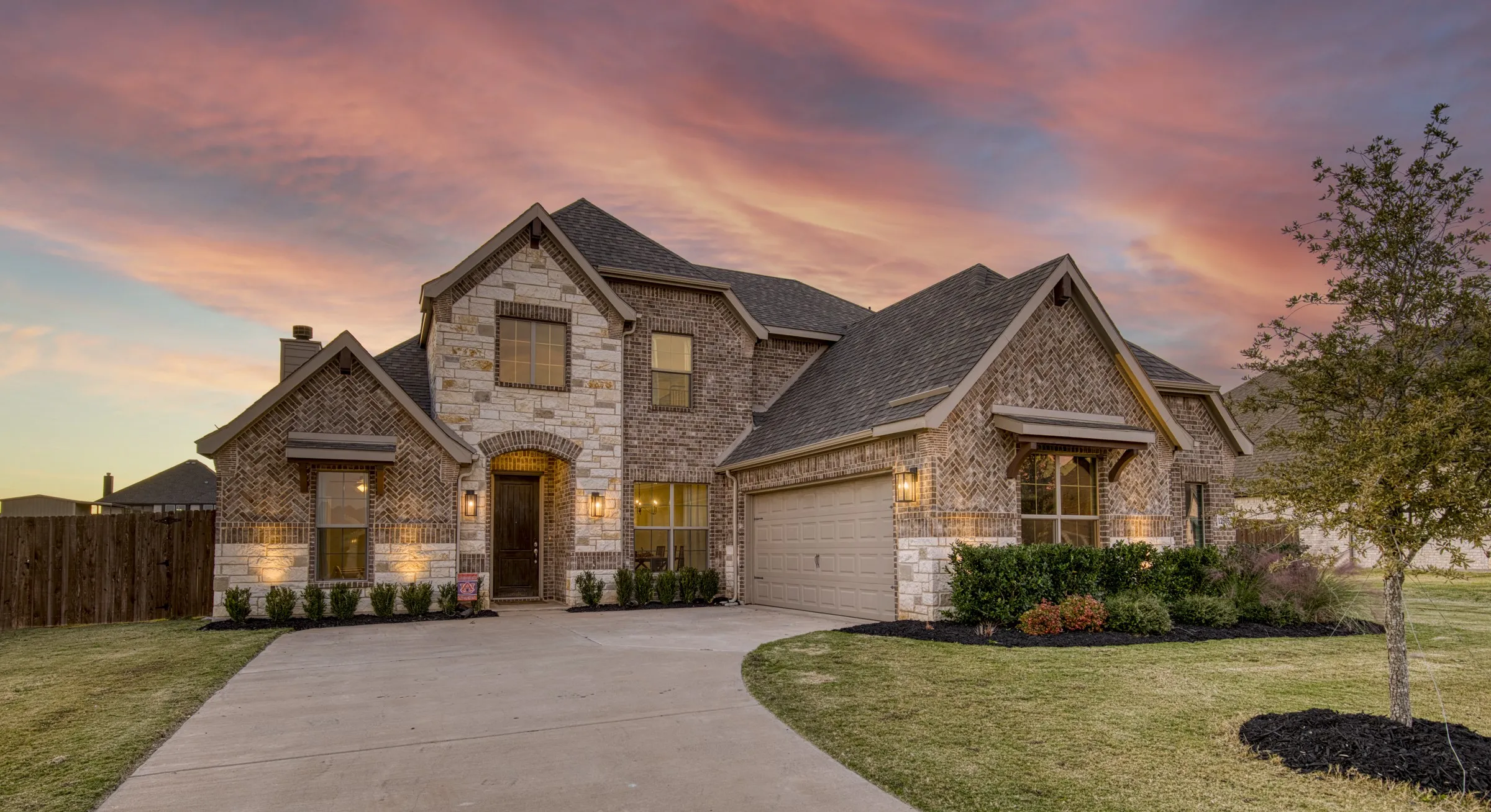 Exterior features long winding driveway to front entry garage and covered entry that warmly welcomes you inside.
