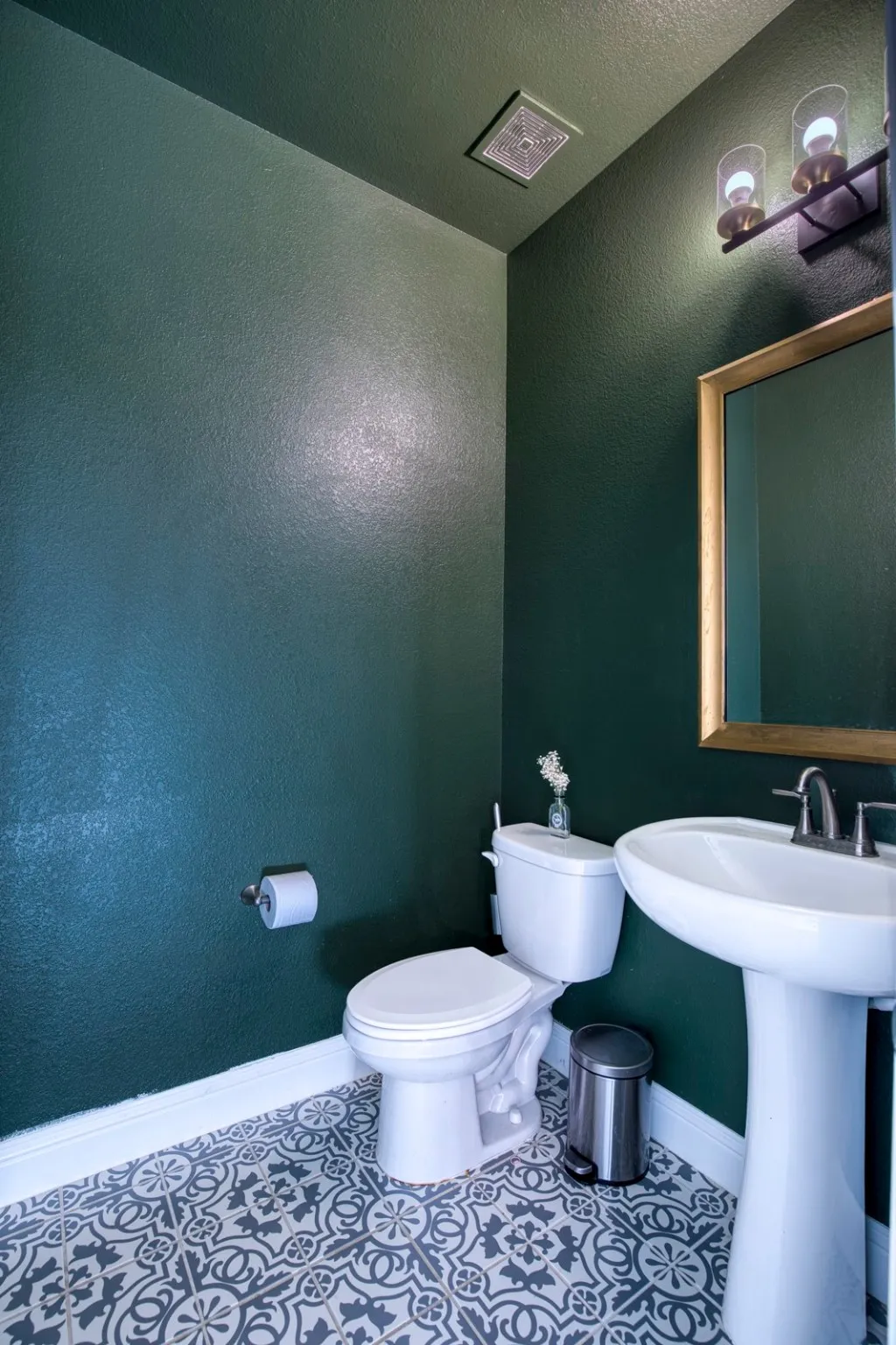 Half bath with pedestal sink.