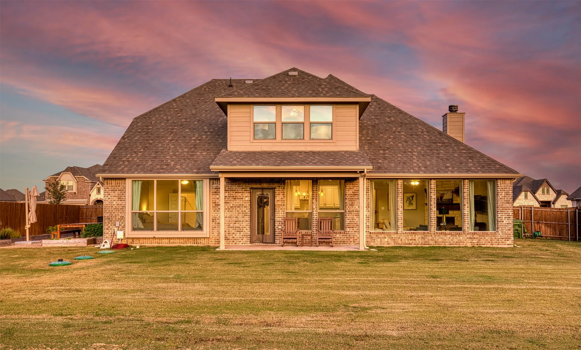 Beautiful backyard with covered porch.
