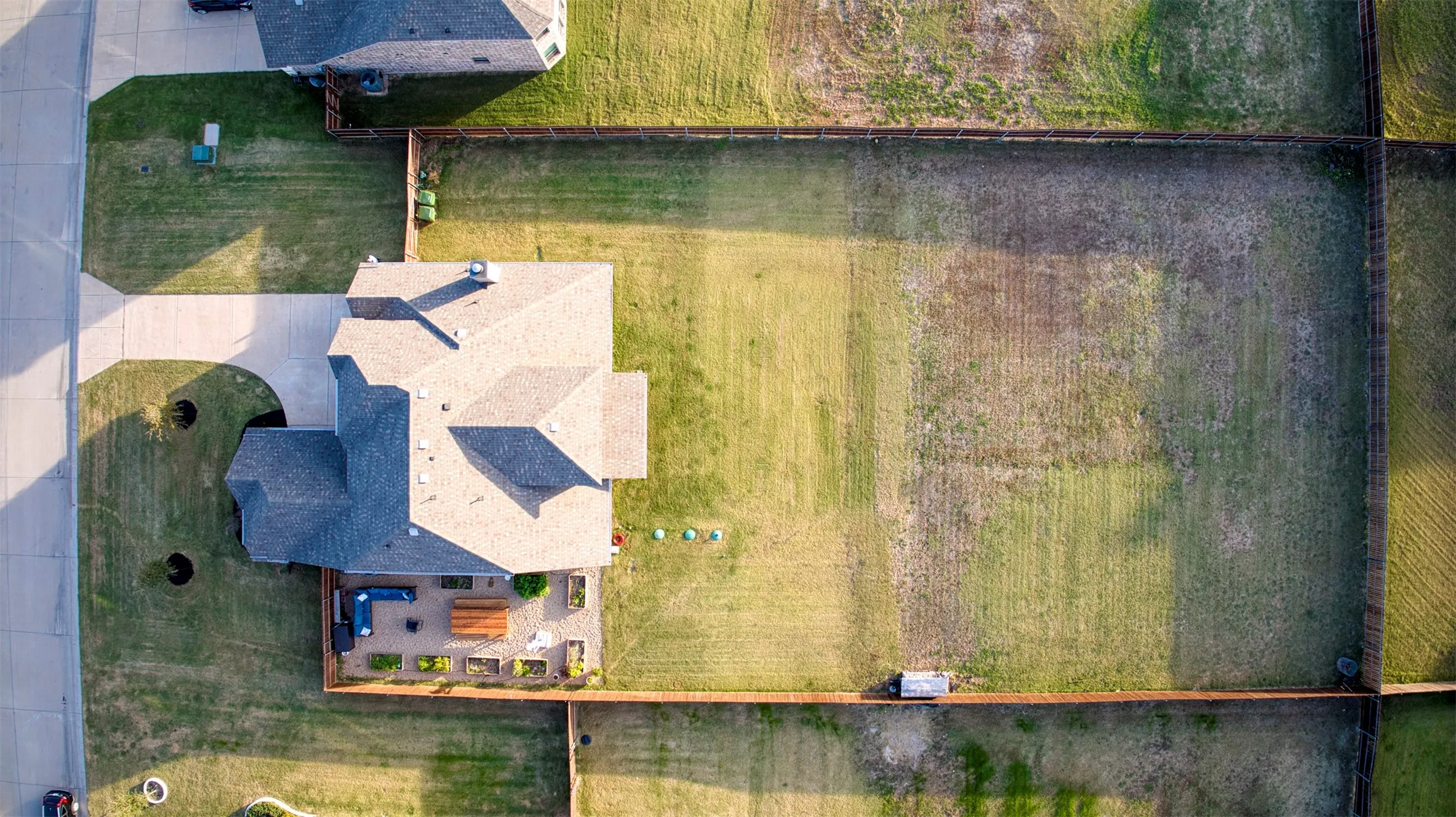 Aerial view of home and lot.