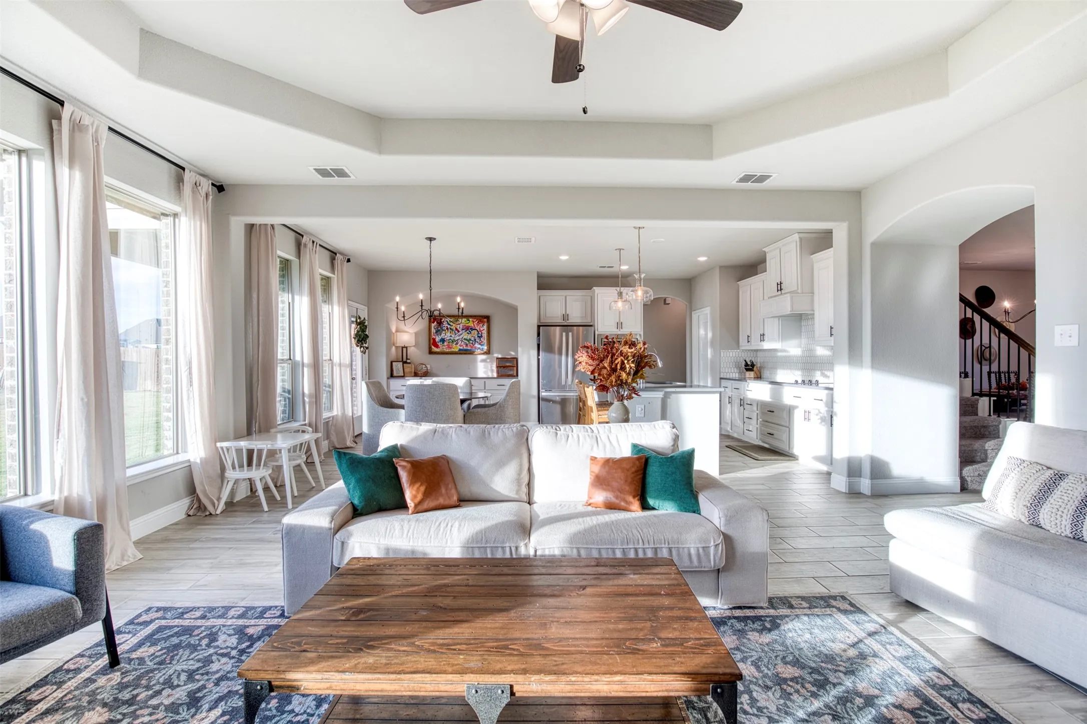 Living room flows seamlessly to kitchen and breakfast room.