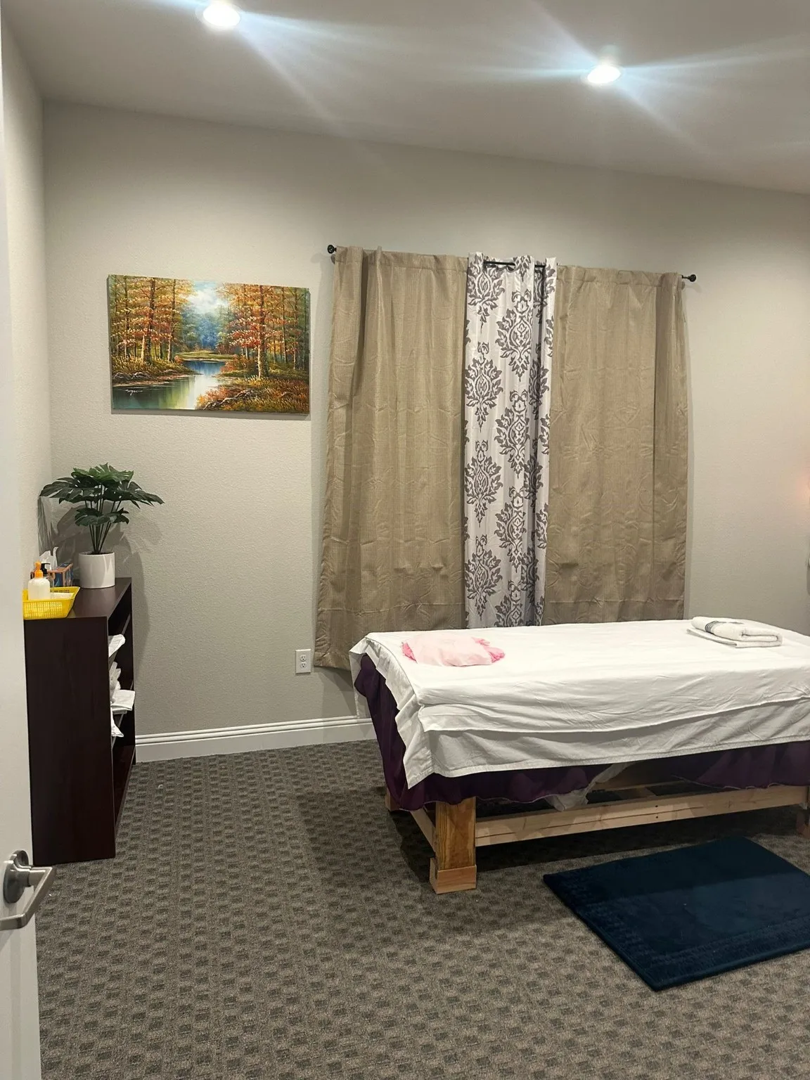 Carpeted bedroom featuring baseboards