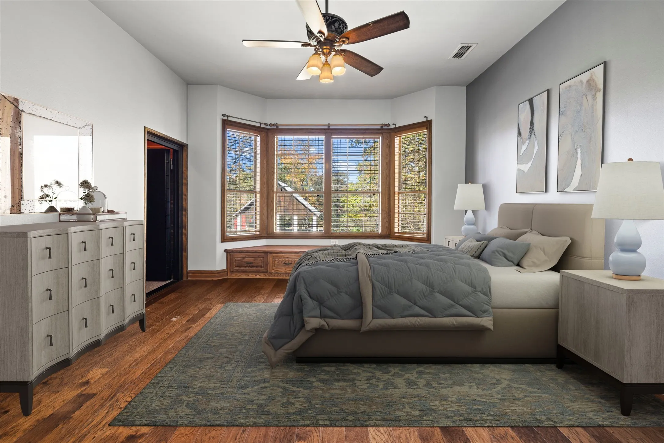 Bedroom featuring dark wood-type flooring and ceiling fan