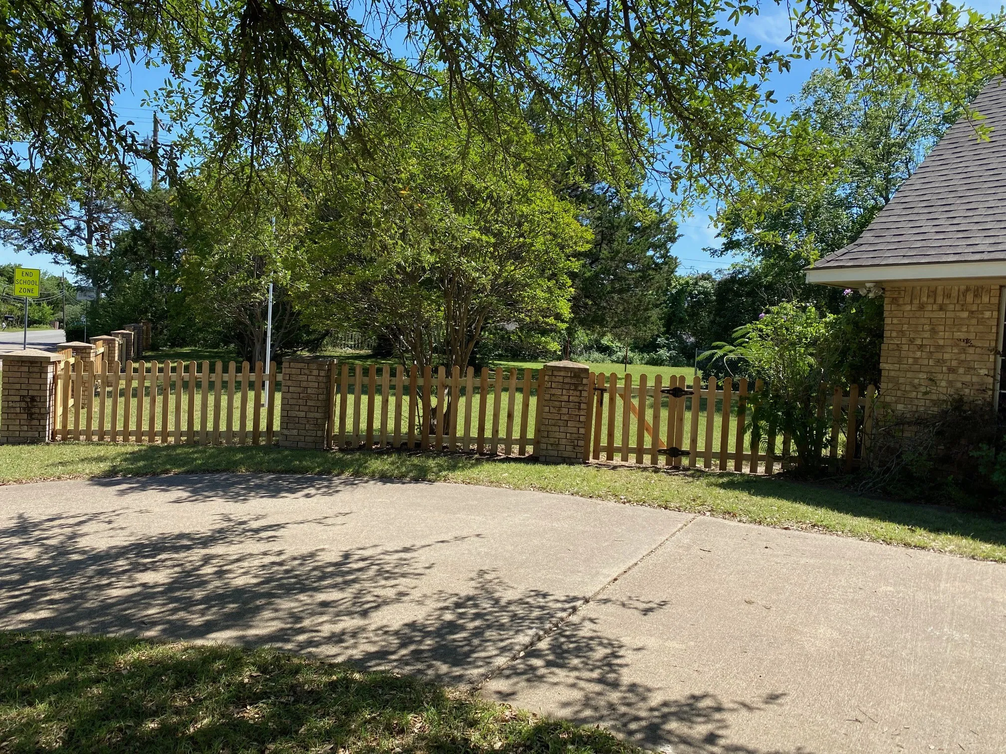 New Picket fence and gate near front of house