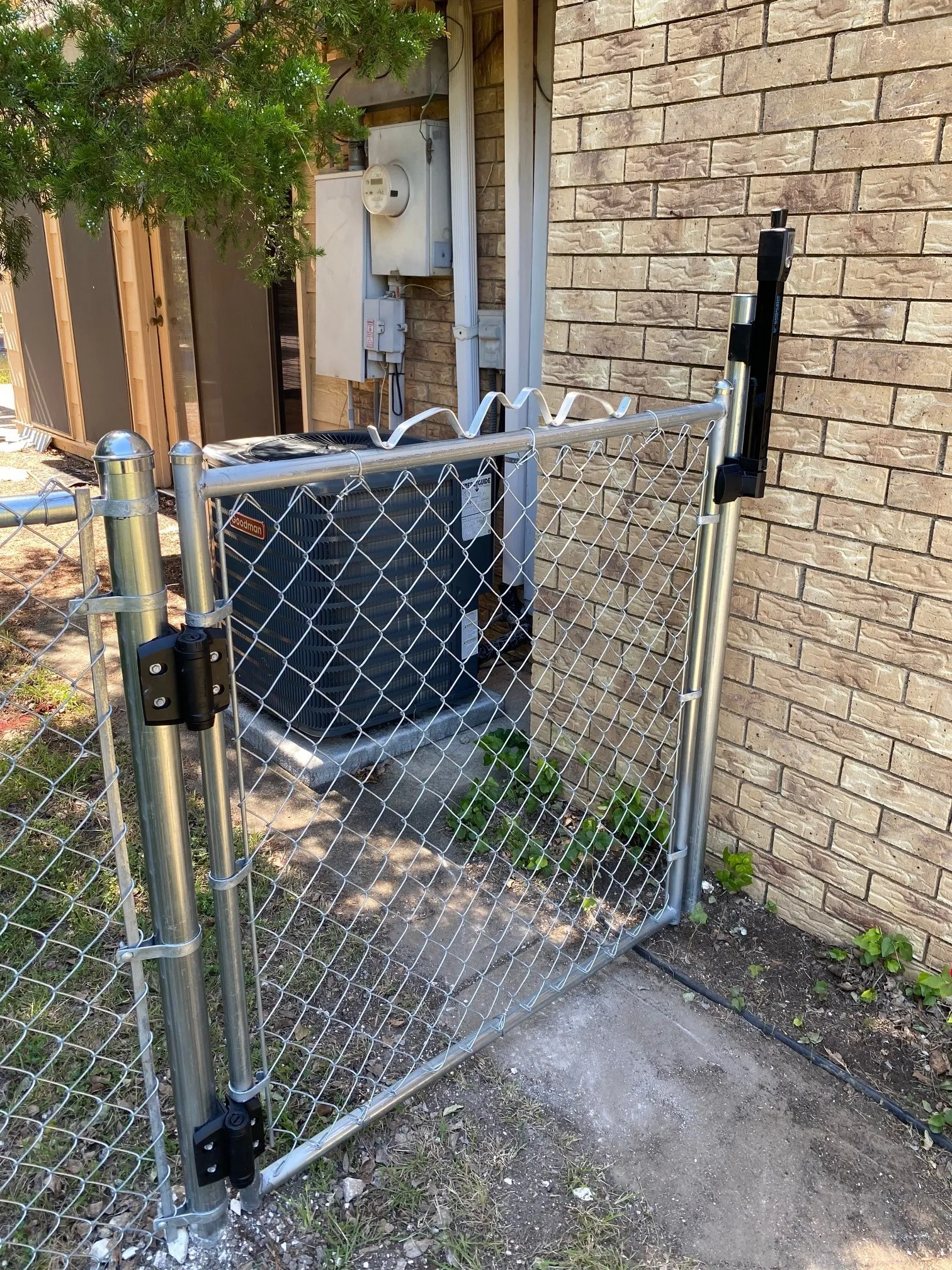 New Chain link fence self closing gate.
