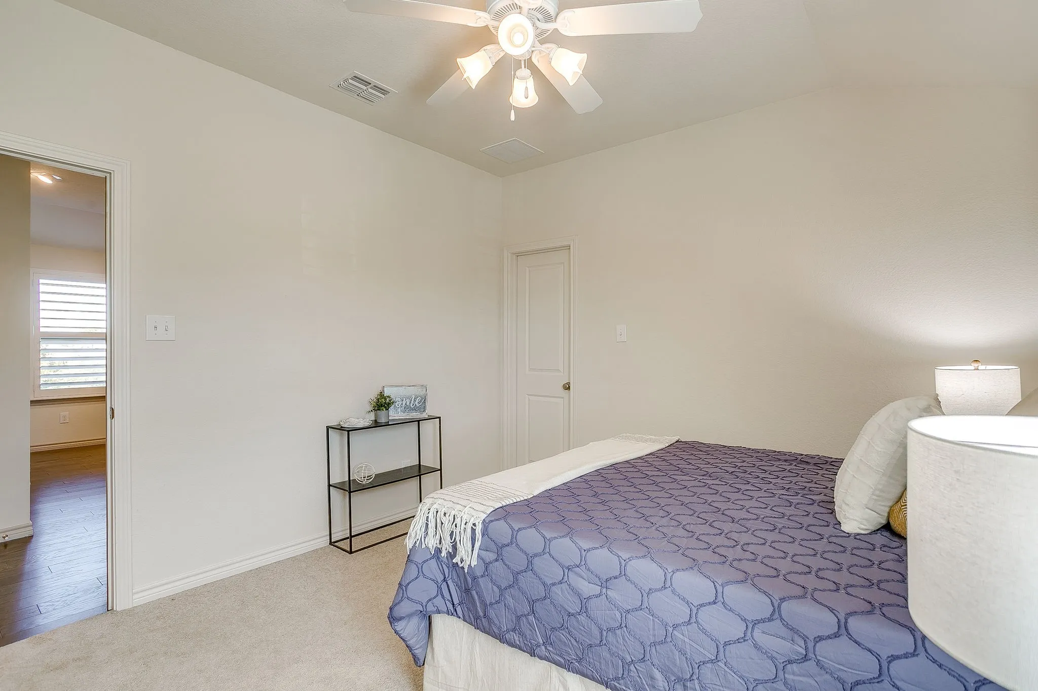 Bedroom with carpet flooring and ceiling fan
