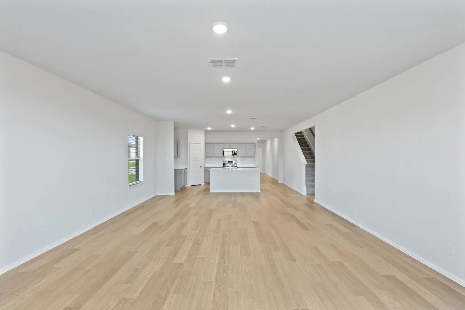Open First Floor in the Holden home plan by Trophy Signature Homes – REPRESENTATIVE PHOTO