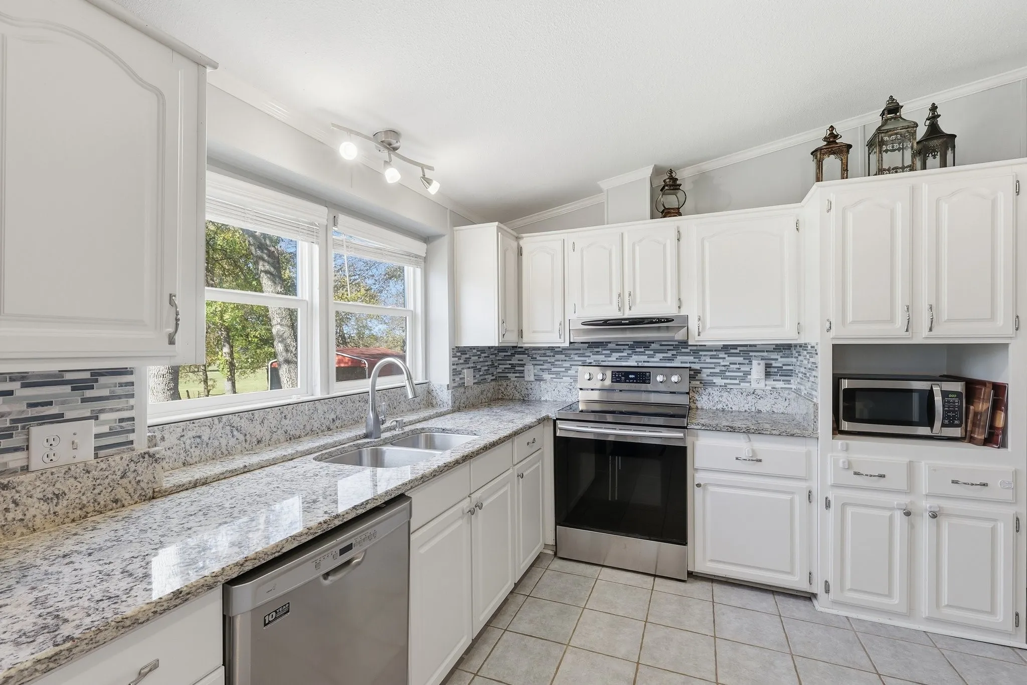 Bright Kitchen with an Alluring Window Above the Sink. Always a View Everywhere Your Eye Touches. Natural Light. Serene Views. A Peaceful Country Escape.