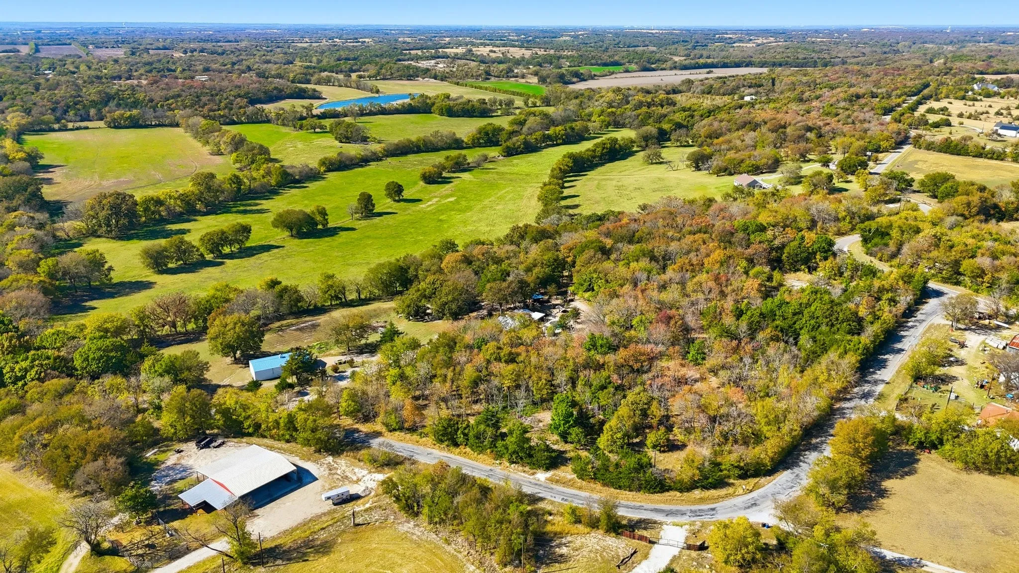 If You Have Been Looking, You Already Know This Property is SPECIAL! The Gorgeous Terrain and Varying Elevations with Hundreds of Mature Trees Such as Pecan, Ash, Elm, &amp; Oak. A Neighboring Cattle Ranch. Deer Appearing at Dusk and Dawn. 2 - 500 Gallon Septic Tanks.