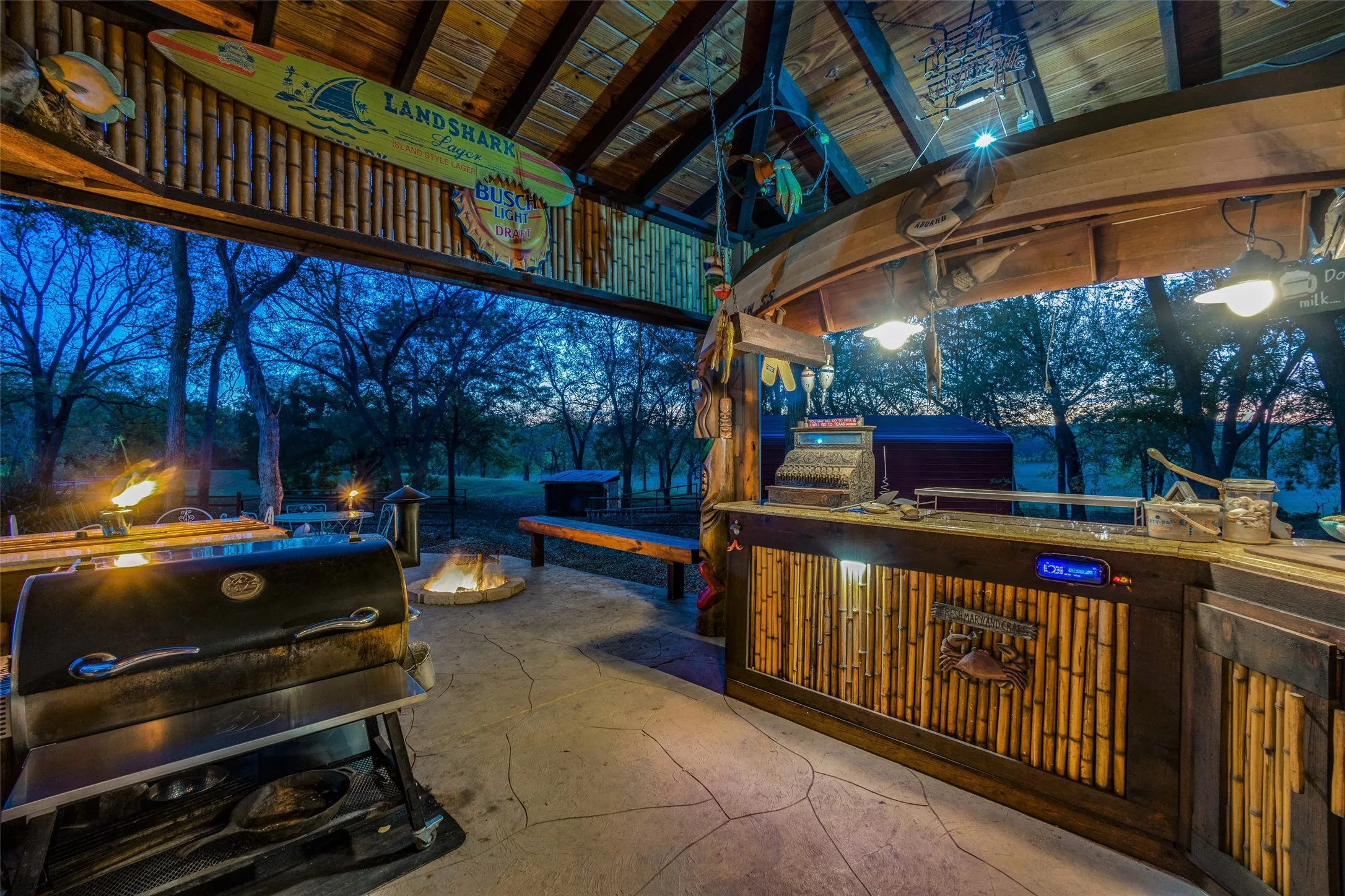 Authentic Island Charm, One of a Kind Artistry, Bamboo Accents, Outdoor Kitchen, and Your Own Private Park. Canoe Chandelier.