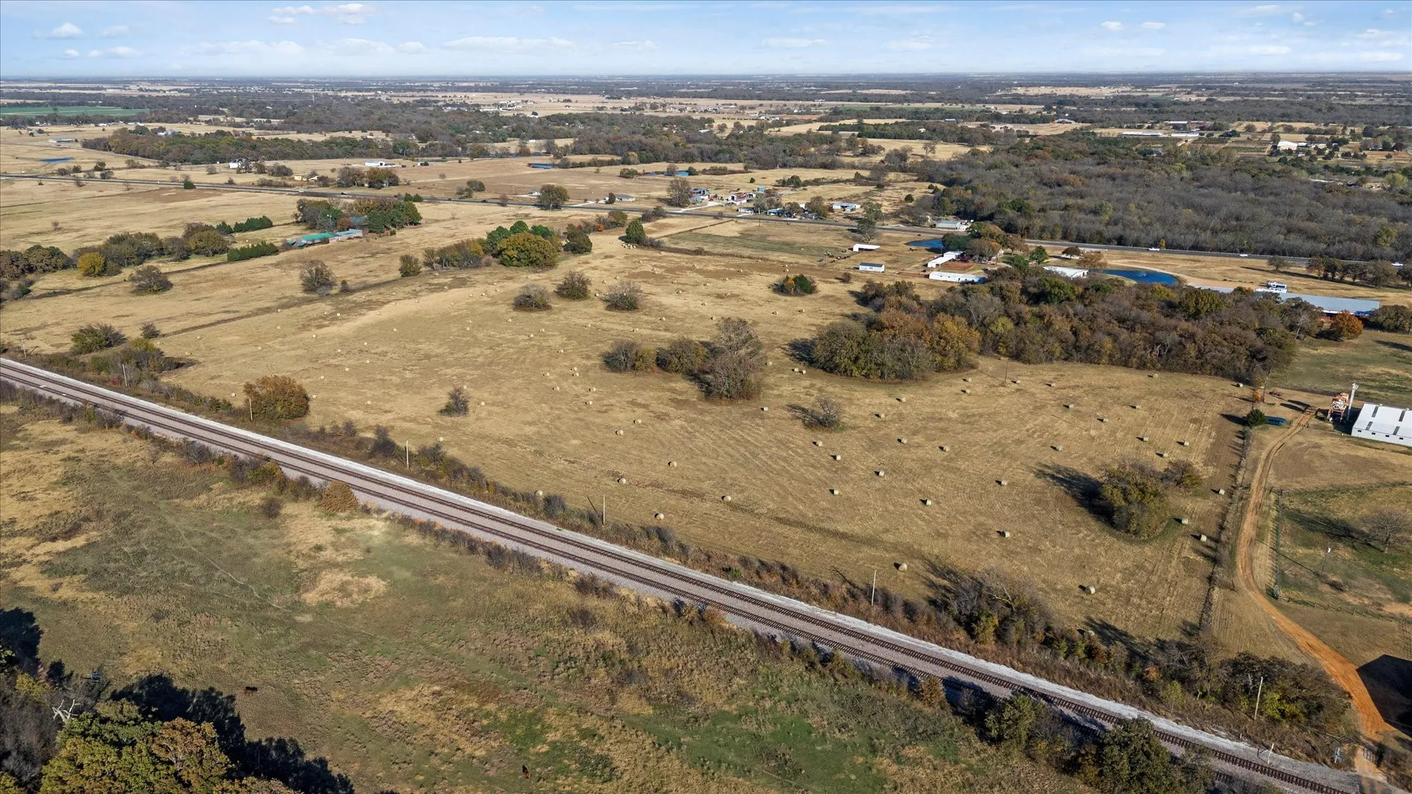 Aerial overview of property's location featuring rural landscape