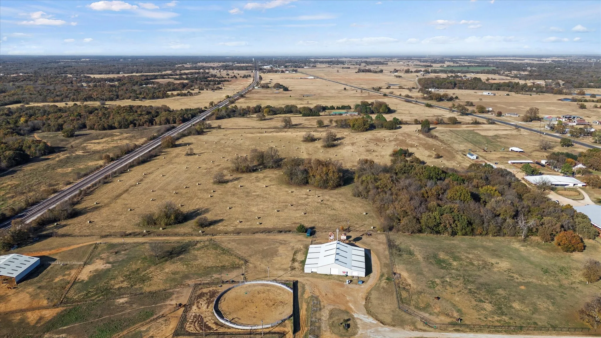 Aerial overview of property's location with rural landscape