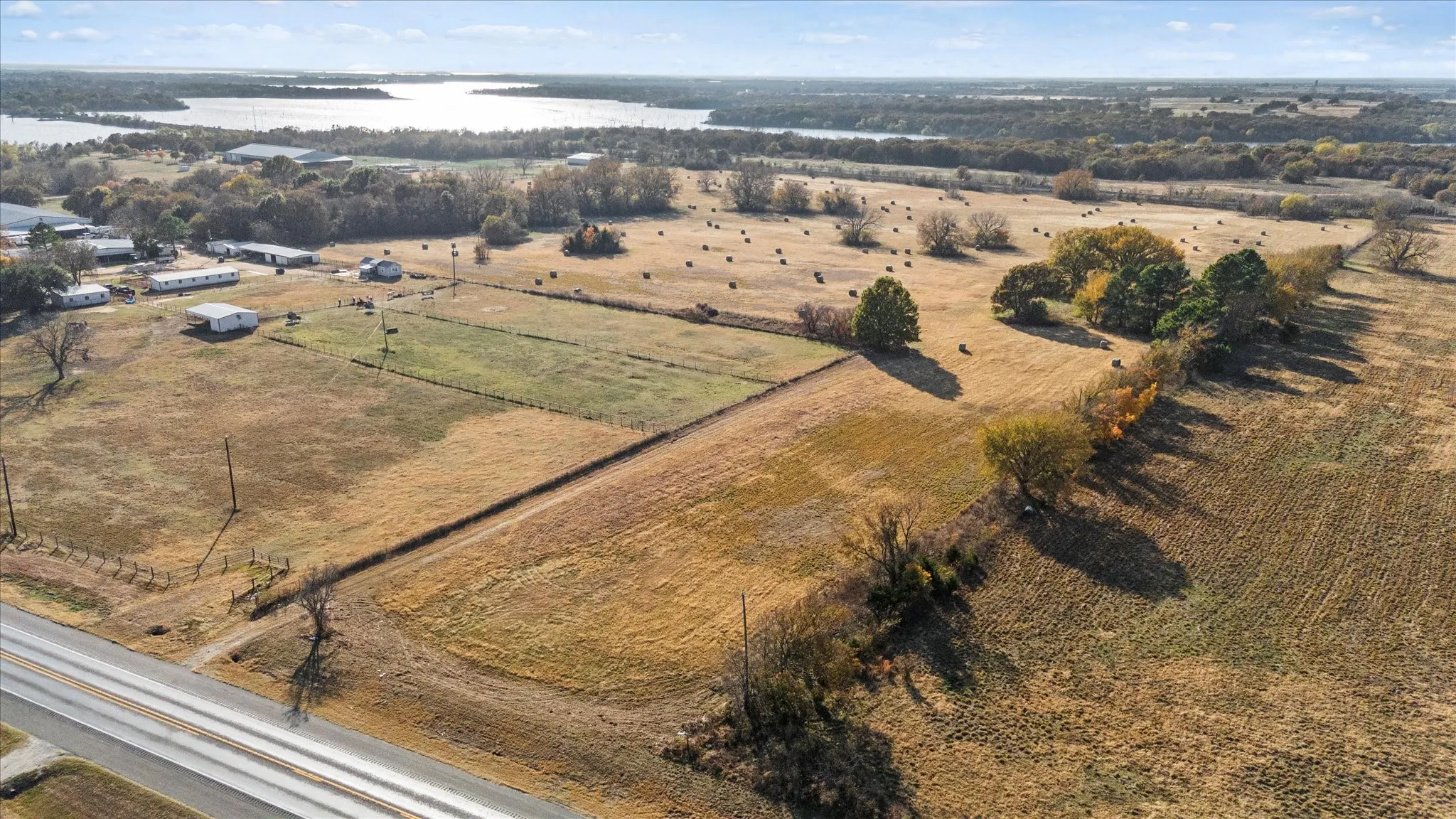 View of property location with a large body of water and rural landscape