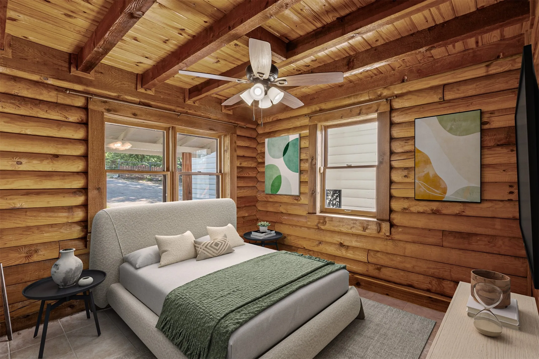 Bedroom featuring rustic walls and ceiling fan