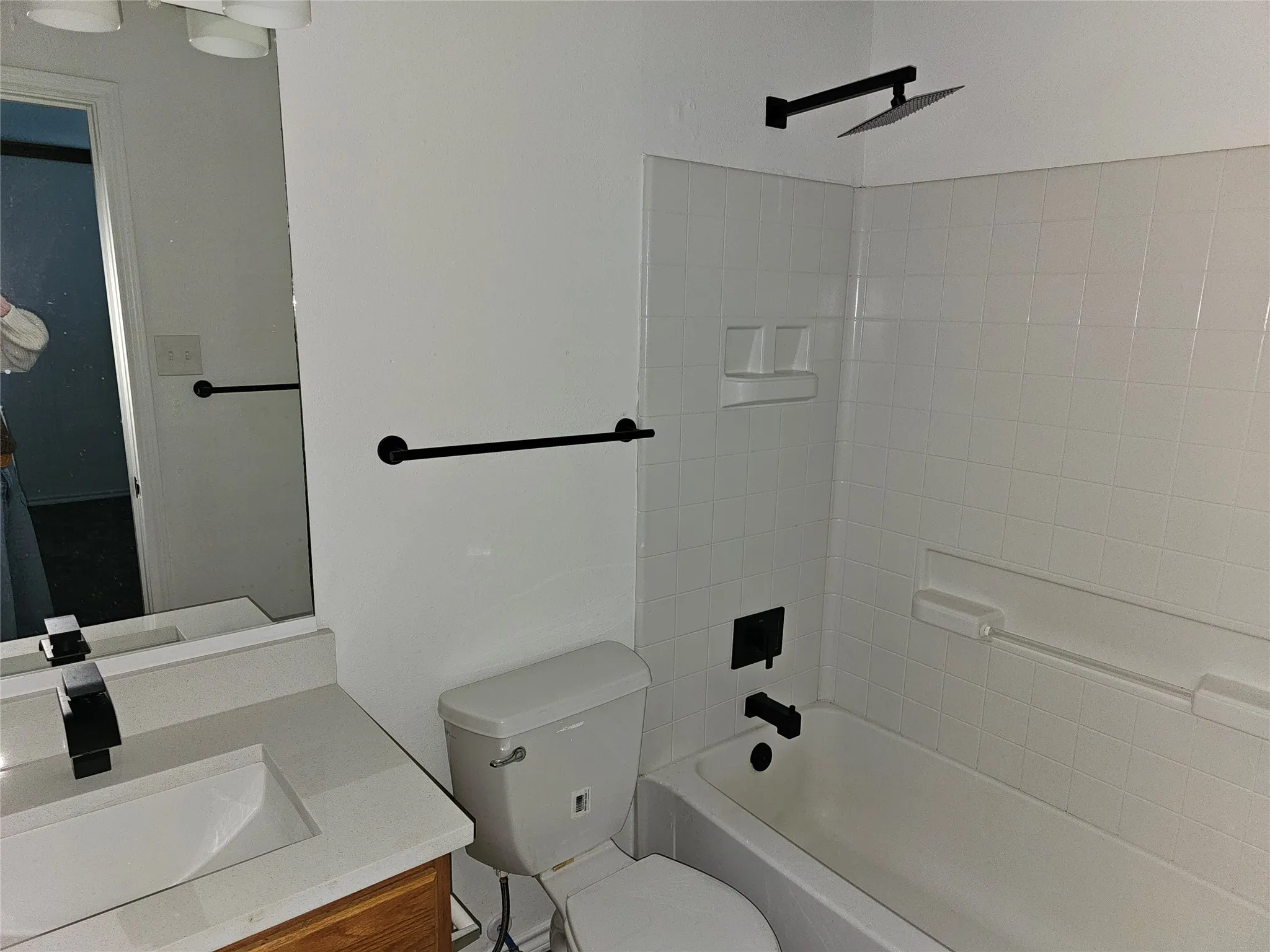 Bathroom with vanity and shower / bath combination