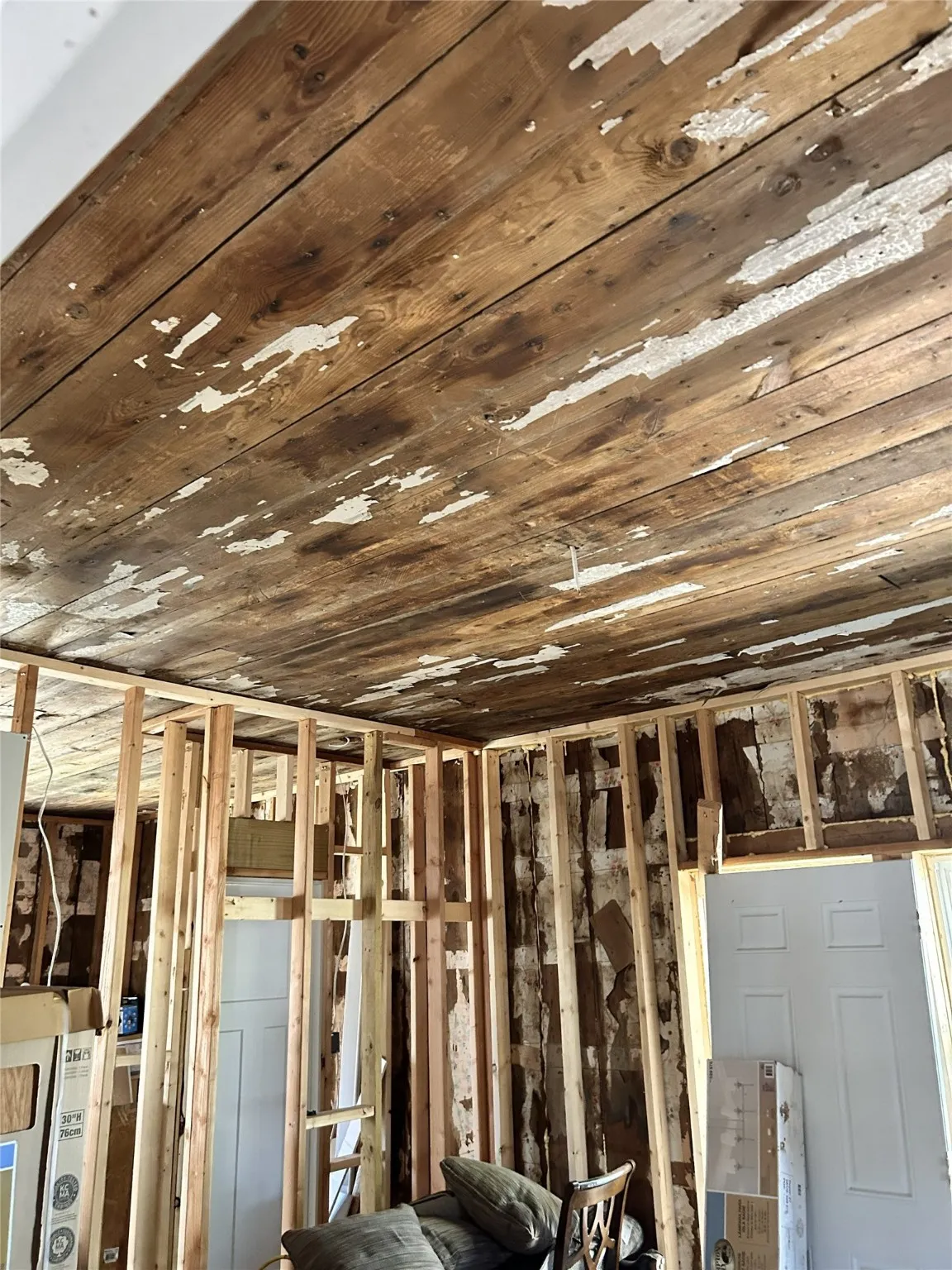 Shiplap ceiling in primary bedroom