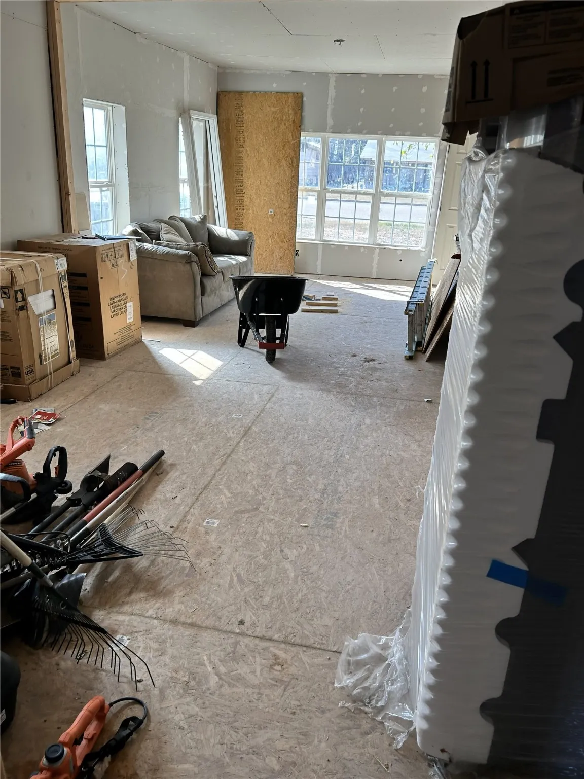 Open concept kitchen, dining area, and living room
