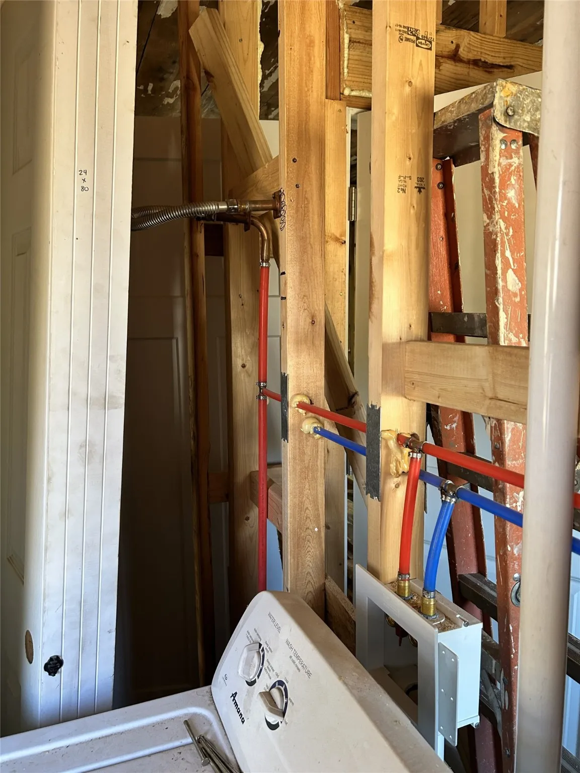 New plumbing for hot water heater in the laundry room