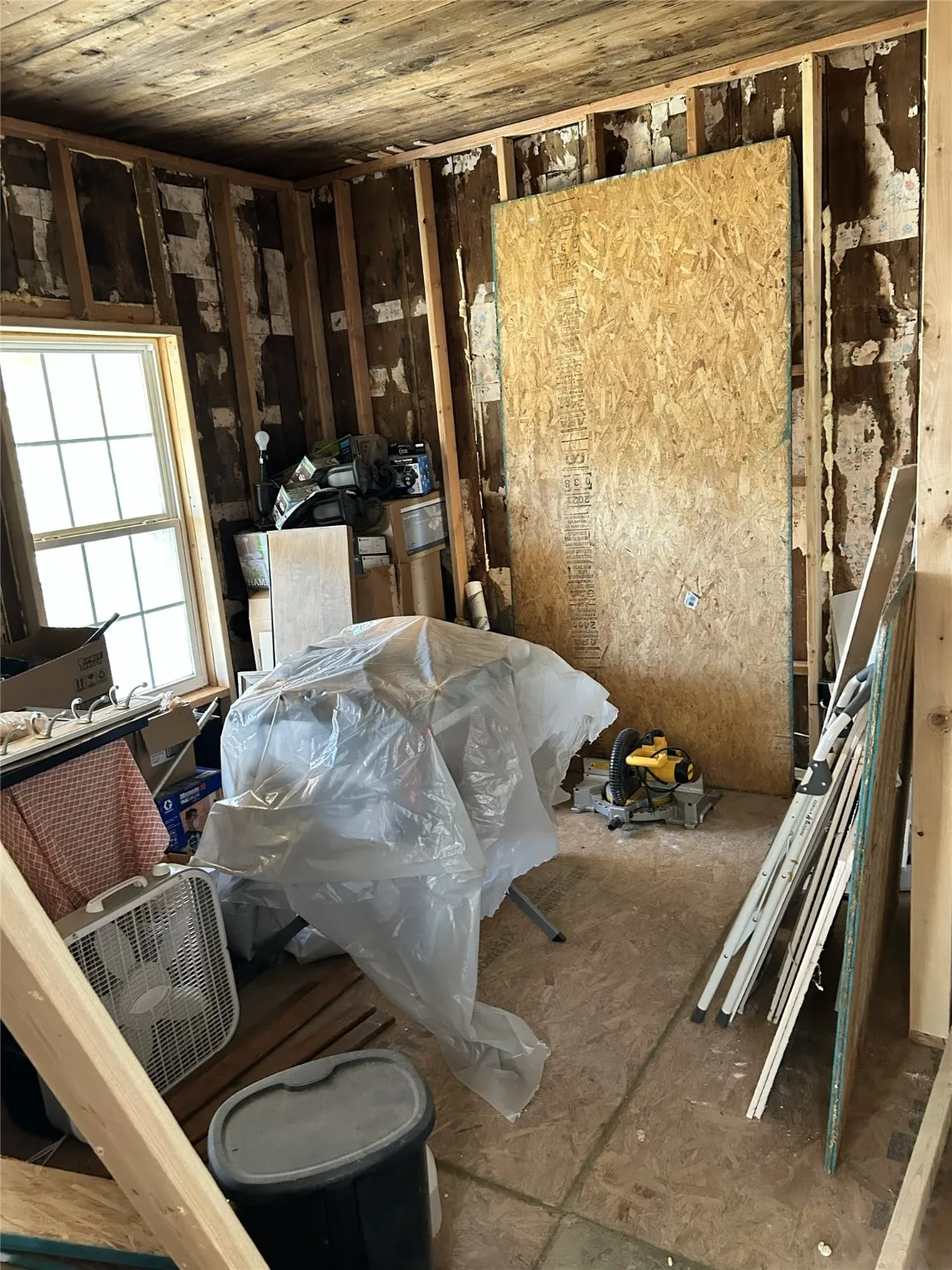 Front bedroom with shiplap ceiling