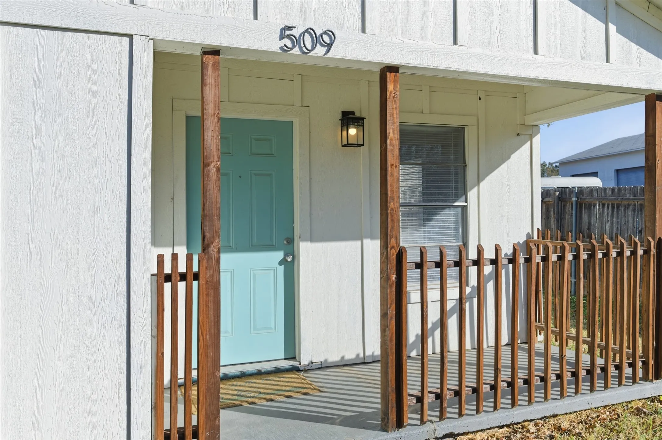 Property entrance with a porch
