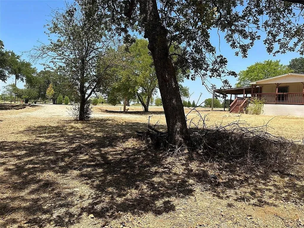 View of yard featuring a porch