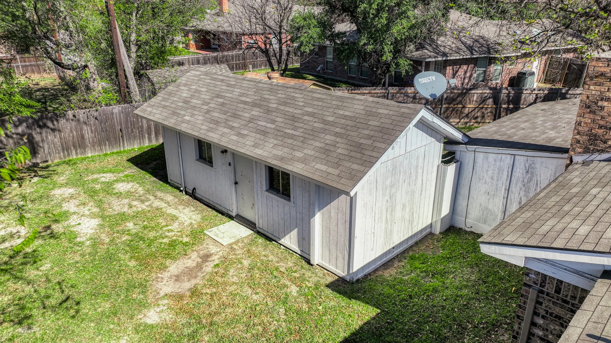 View of outbuilding with a fenced backyard