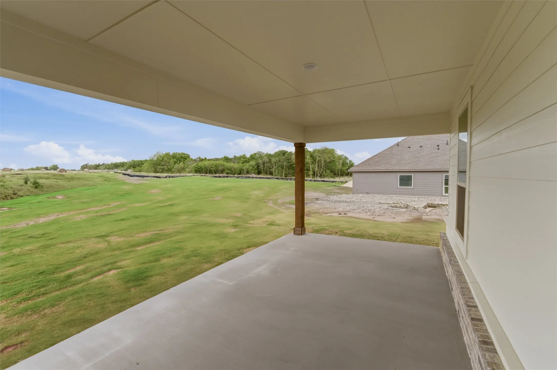 View of patio featuring view of golf course