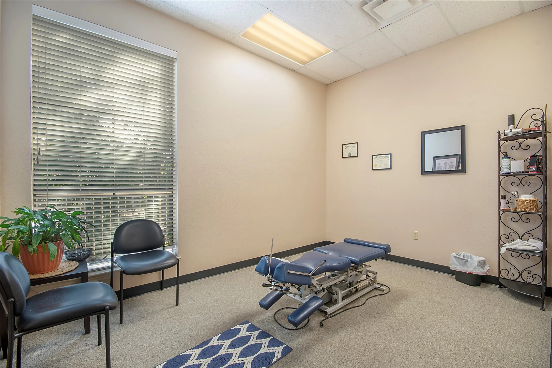 Exercise room featuring a paneled ceiling
