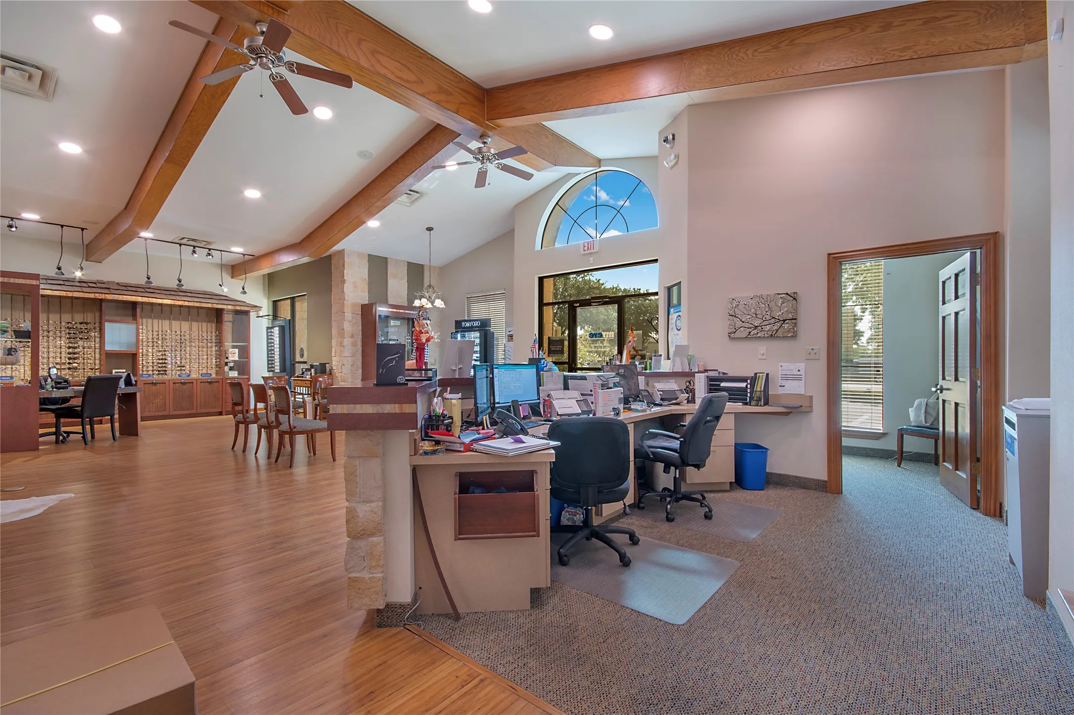 Office featuring beamed ceiling and high vaulted ceiling