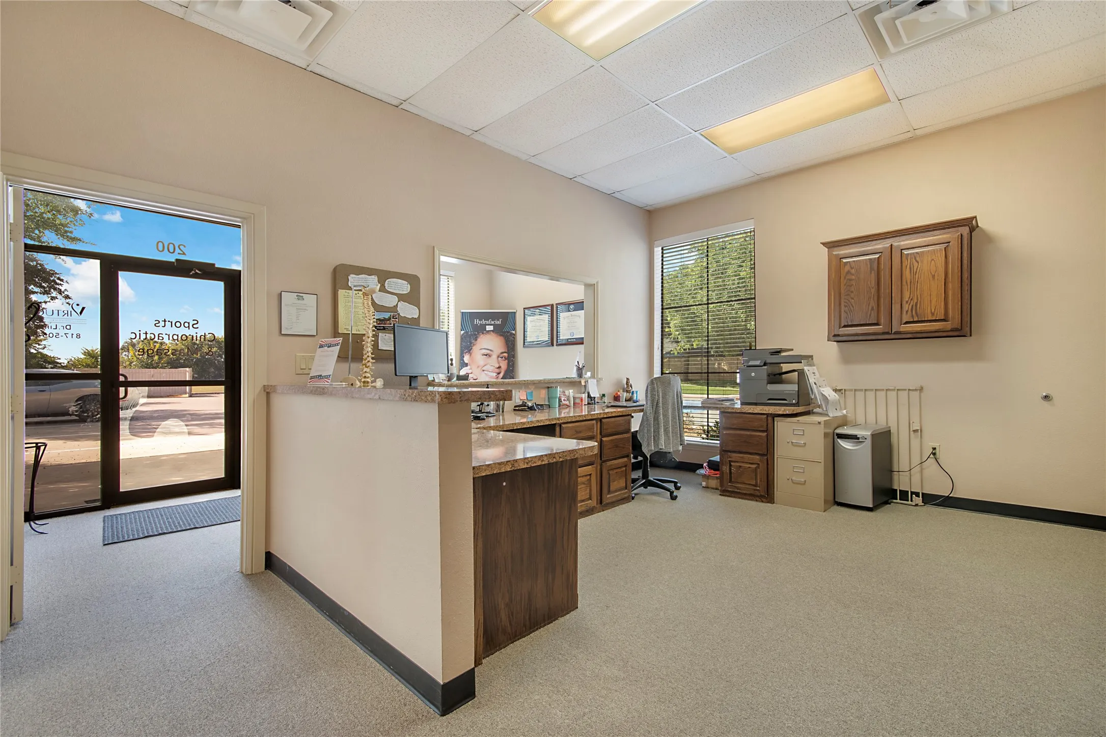 Office area featuring a paneled ceiling