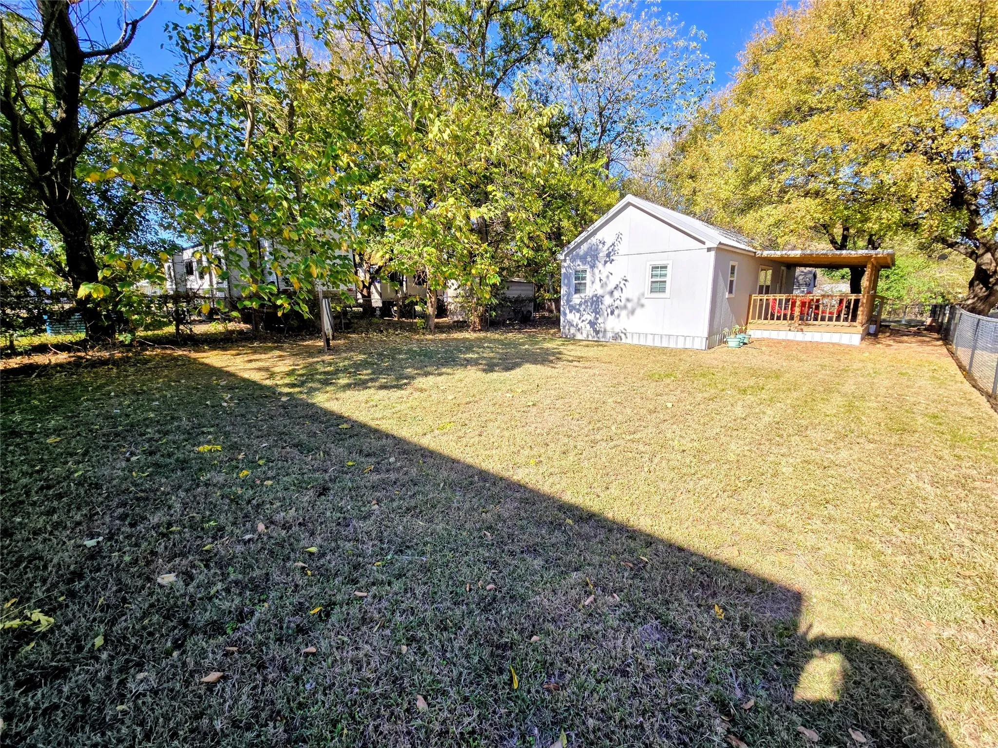 View of yard featuring view of wooded area