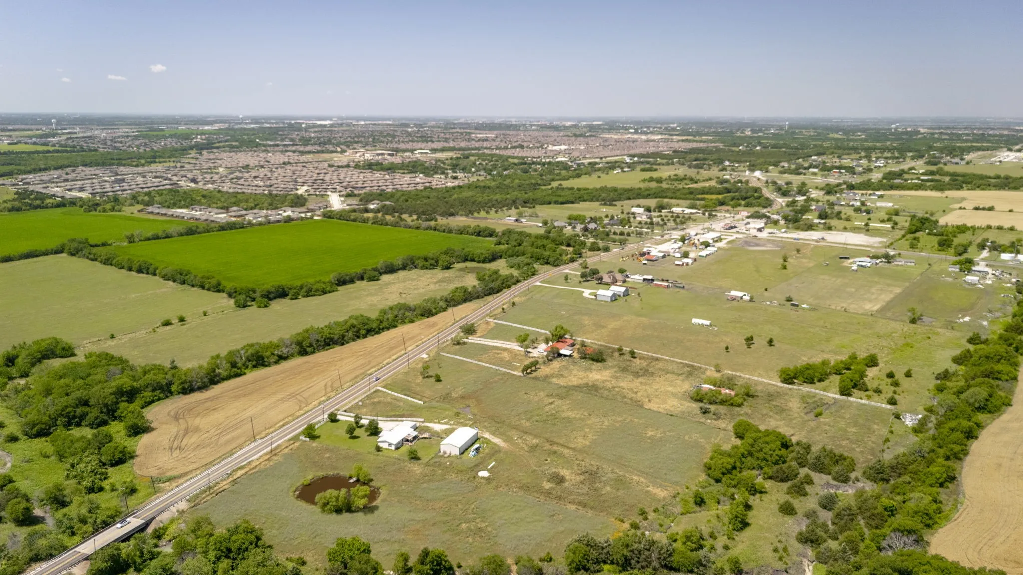 Aerial view of property's location featuring rural landscape