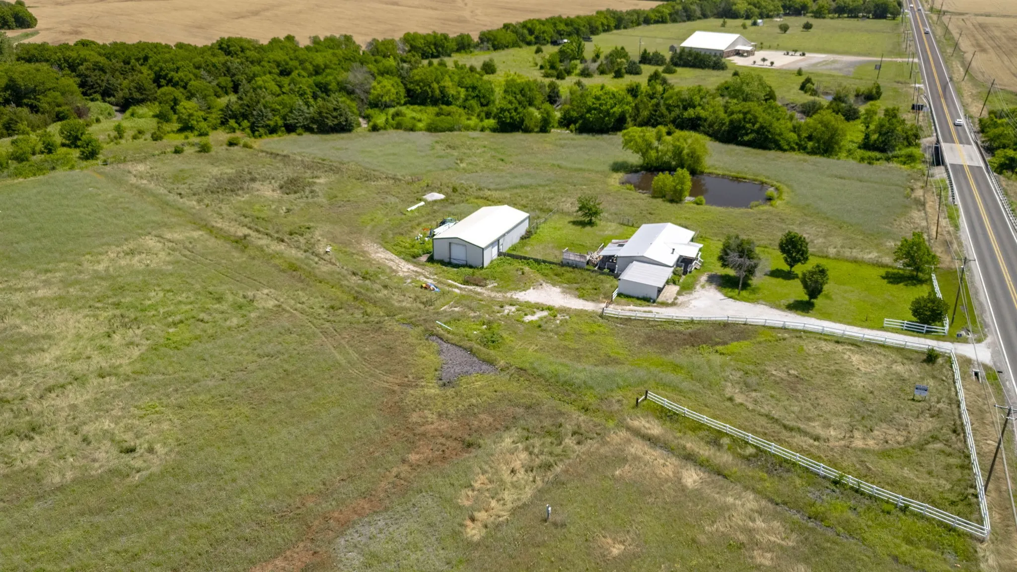 Aerial view of property's location featuring rural landscape
