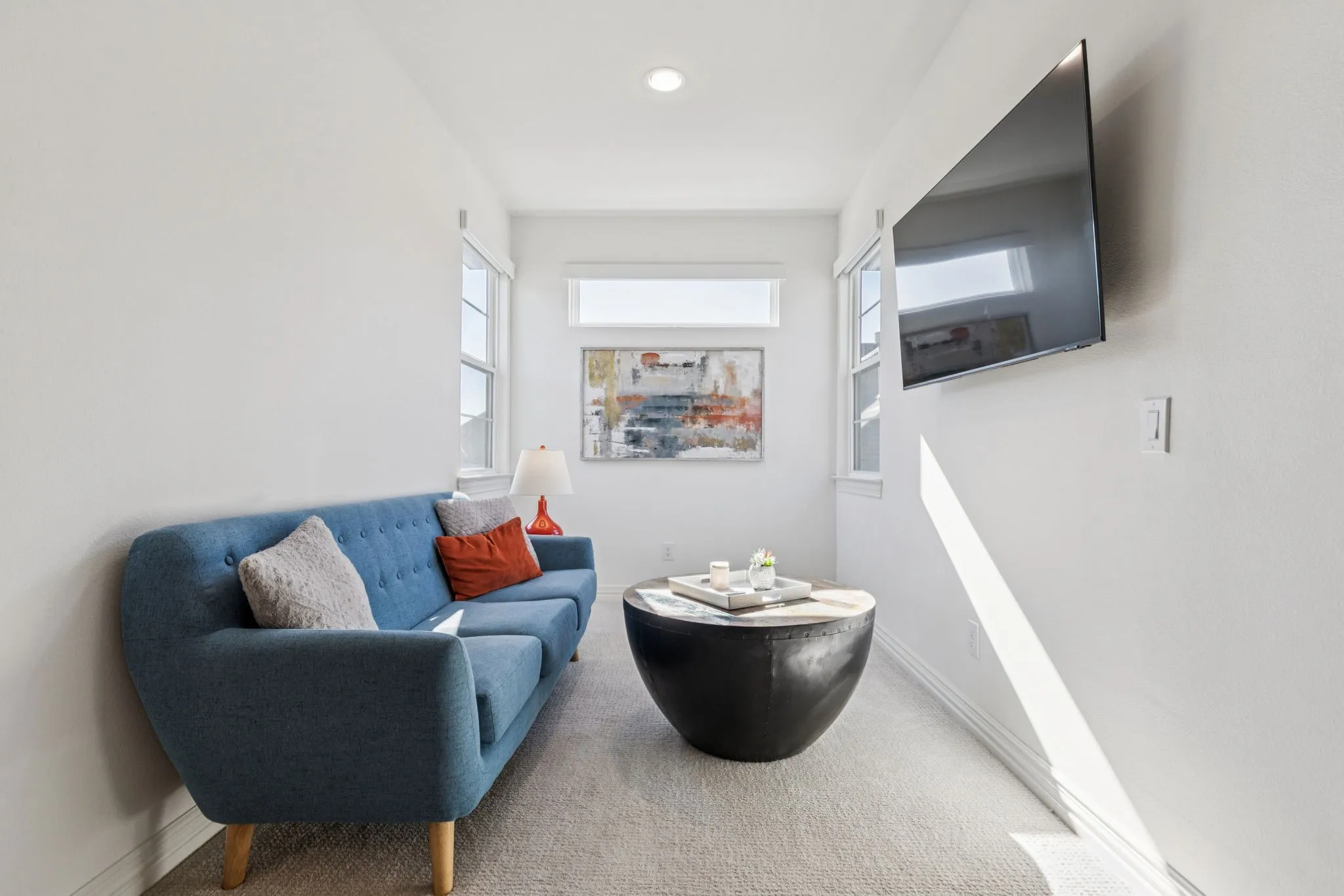 Sitting room with carpet and recessed lighting
