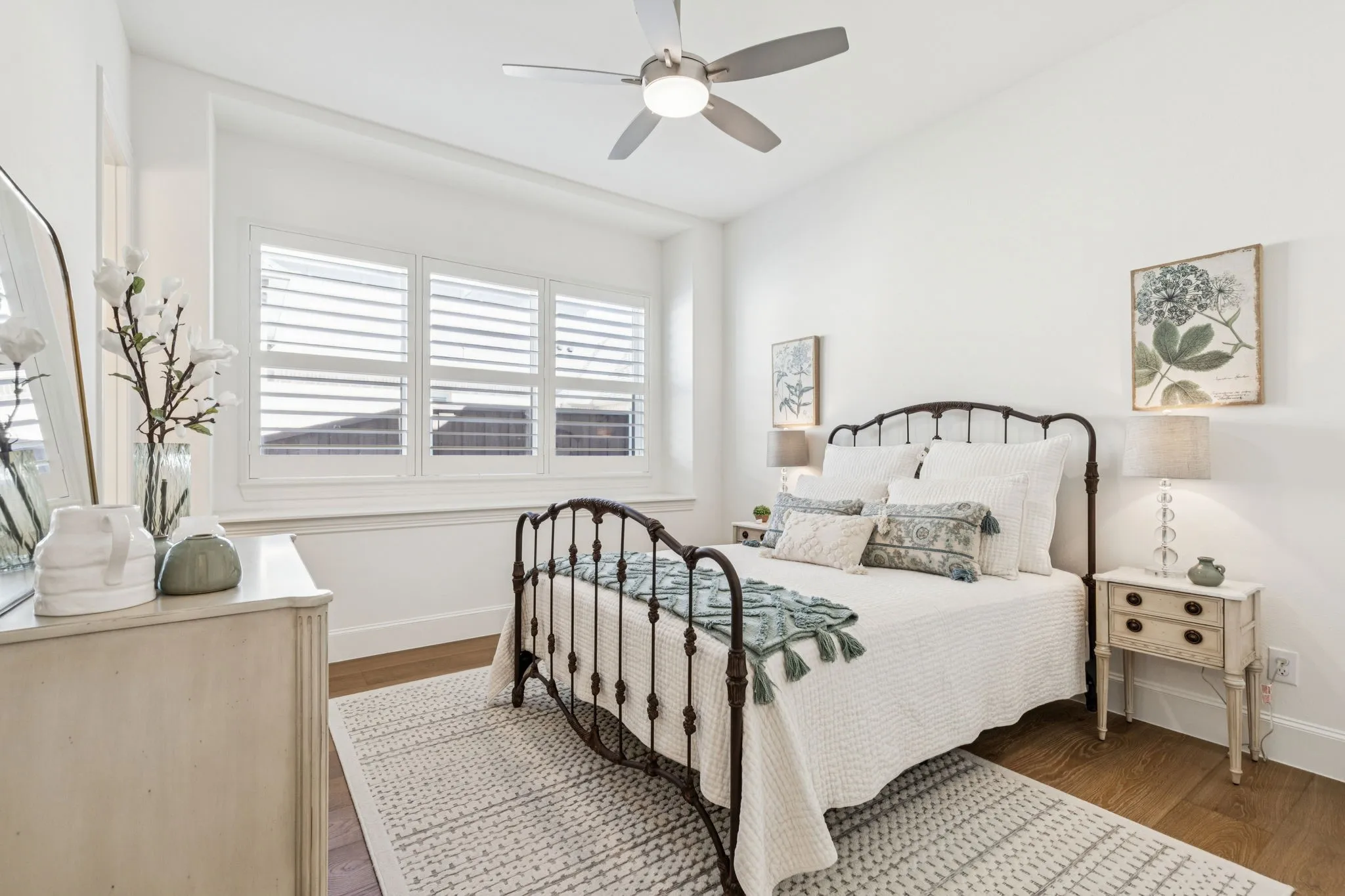 Bedroom featuring dark wood-type flooring and ceiling fan