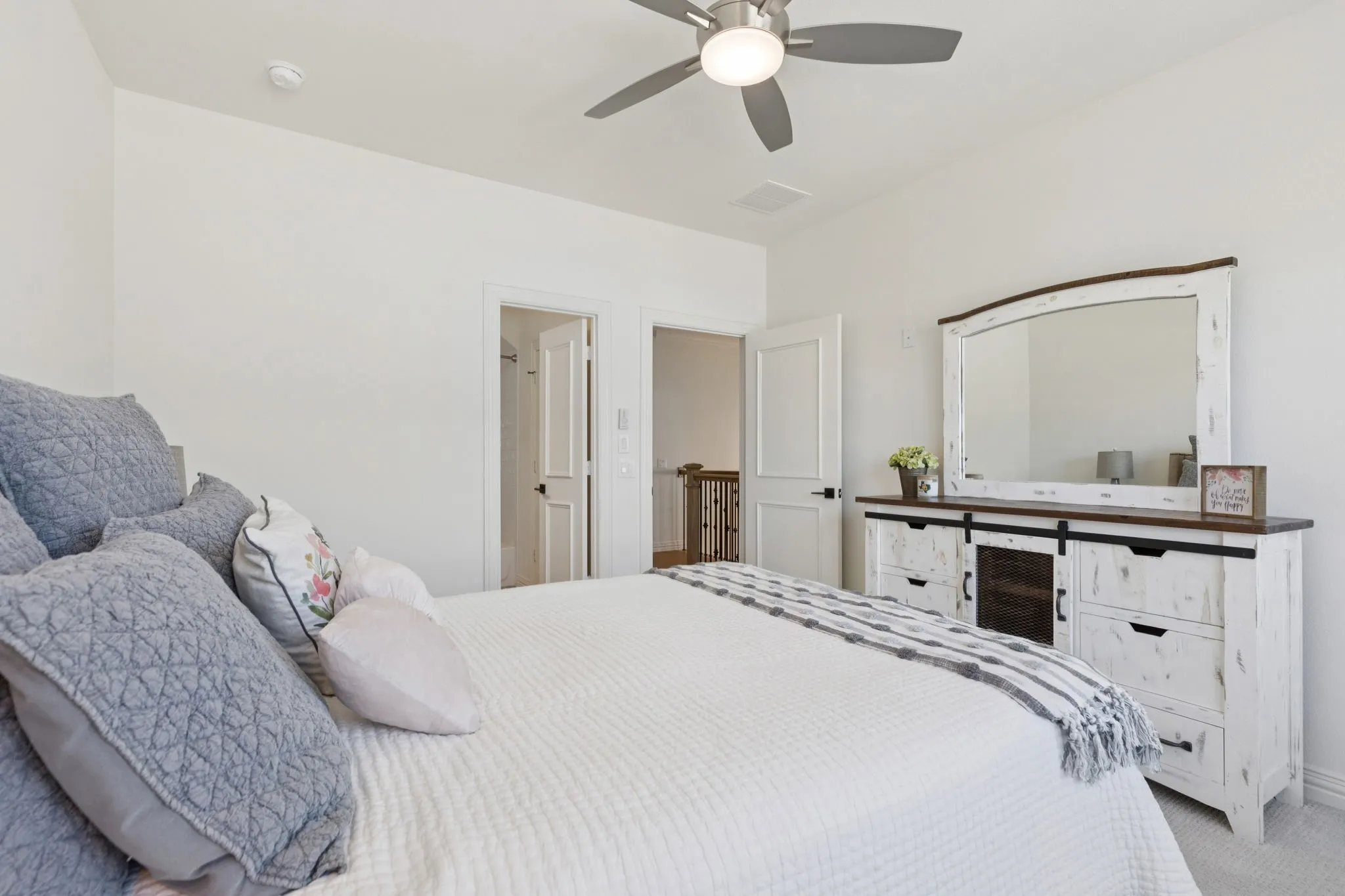 Bedroom featuring carpet flooring and ceiling fan