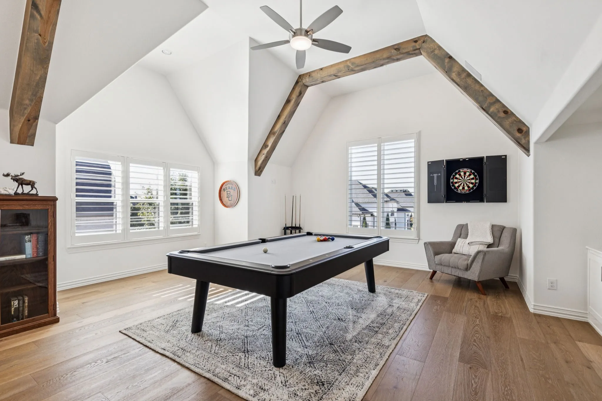 Recreation room featuring billiards table, wood finished floors, and ceiling fan
