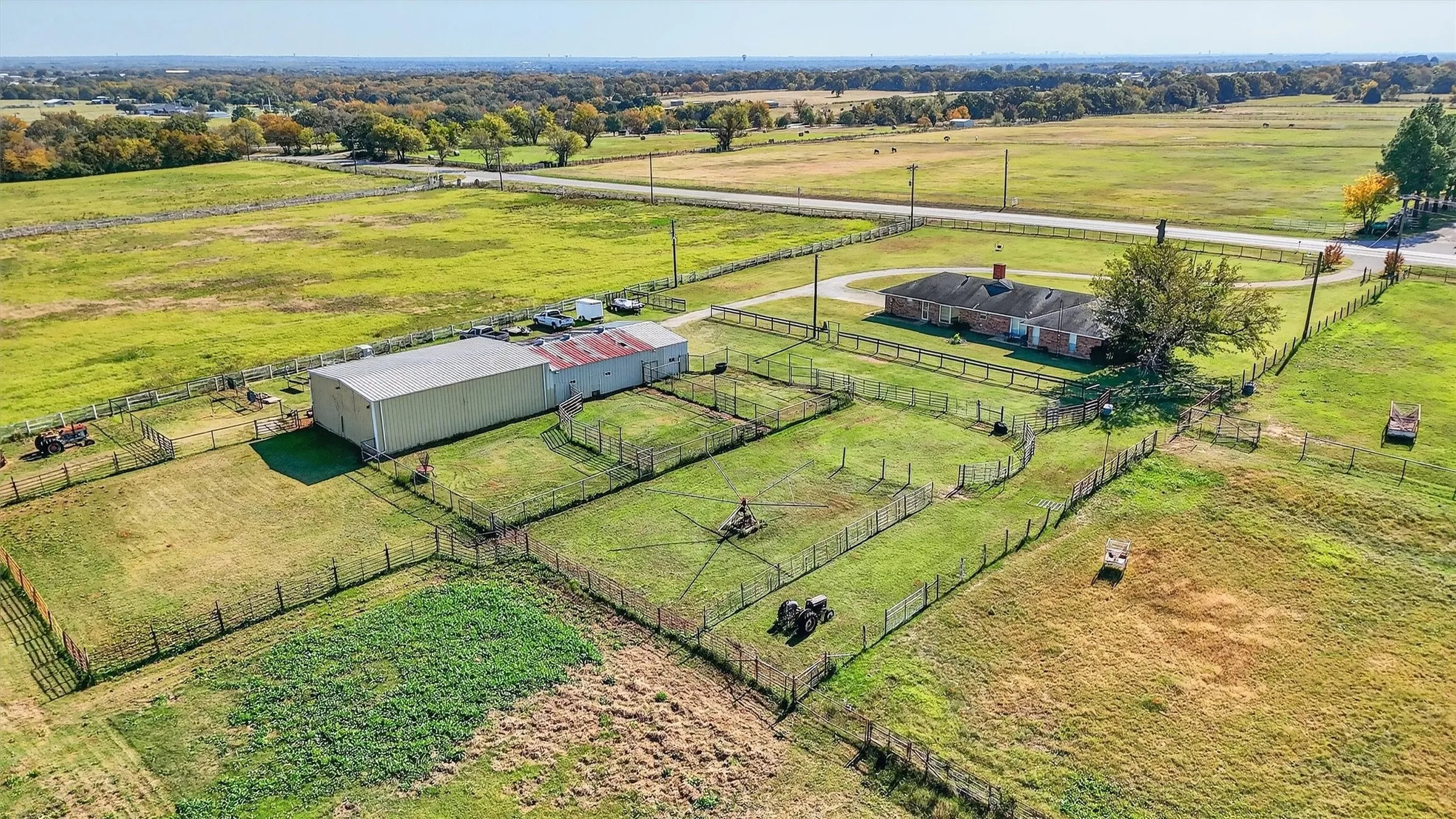 Aerial view of sparsely populated area with agricultural land
