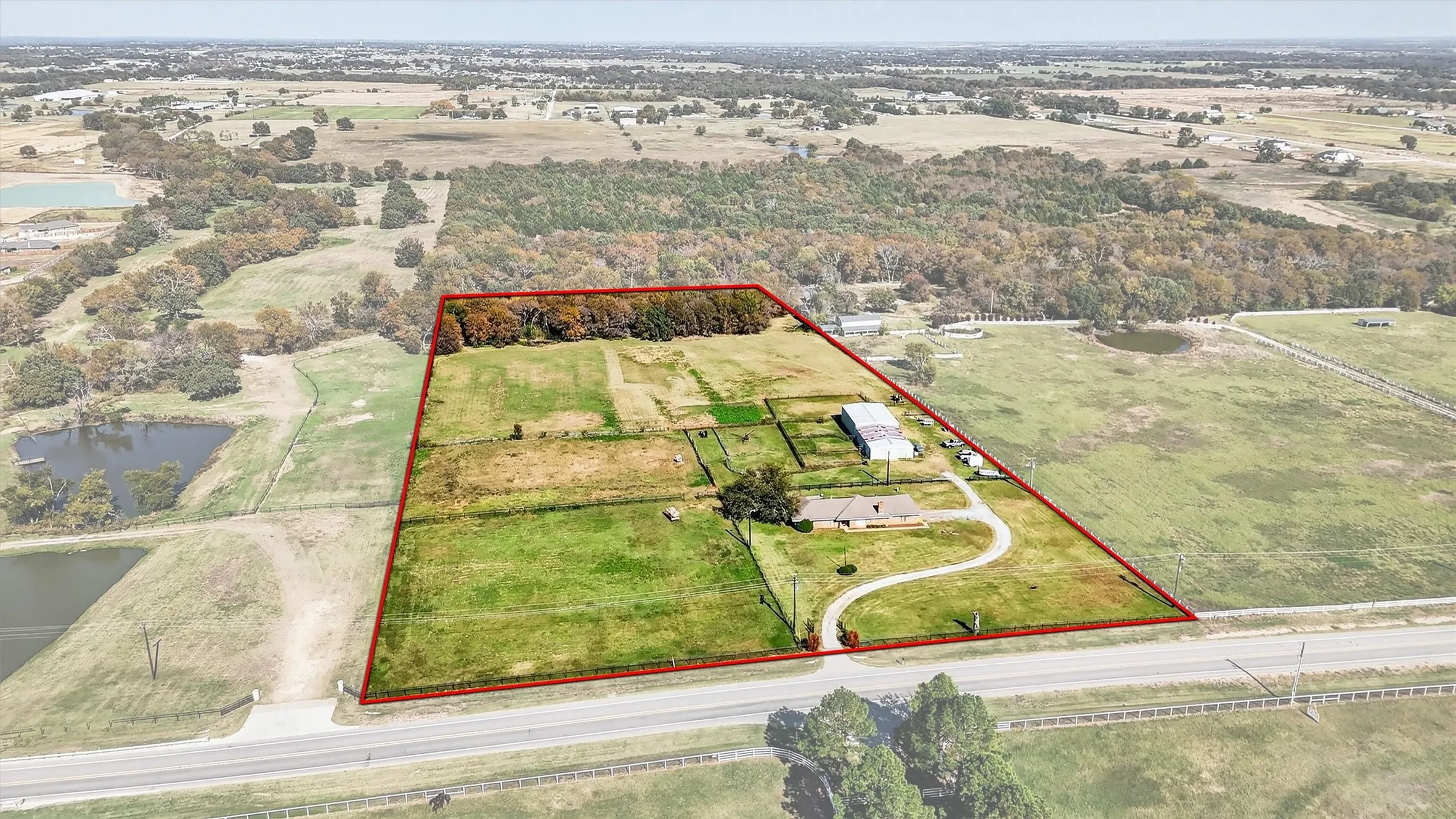 View of property location featuring a nearby body of water and property parcel outlined