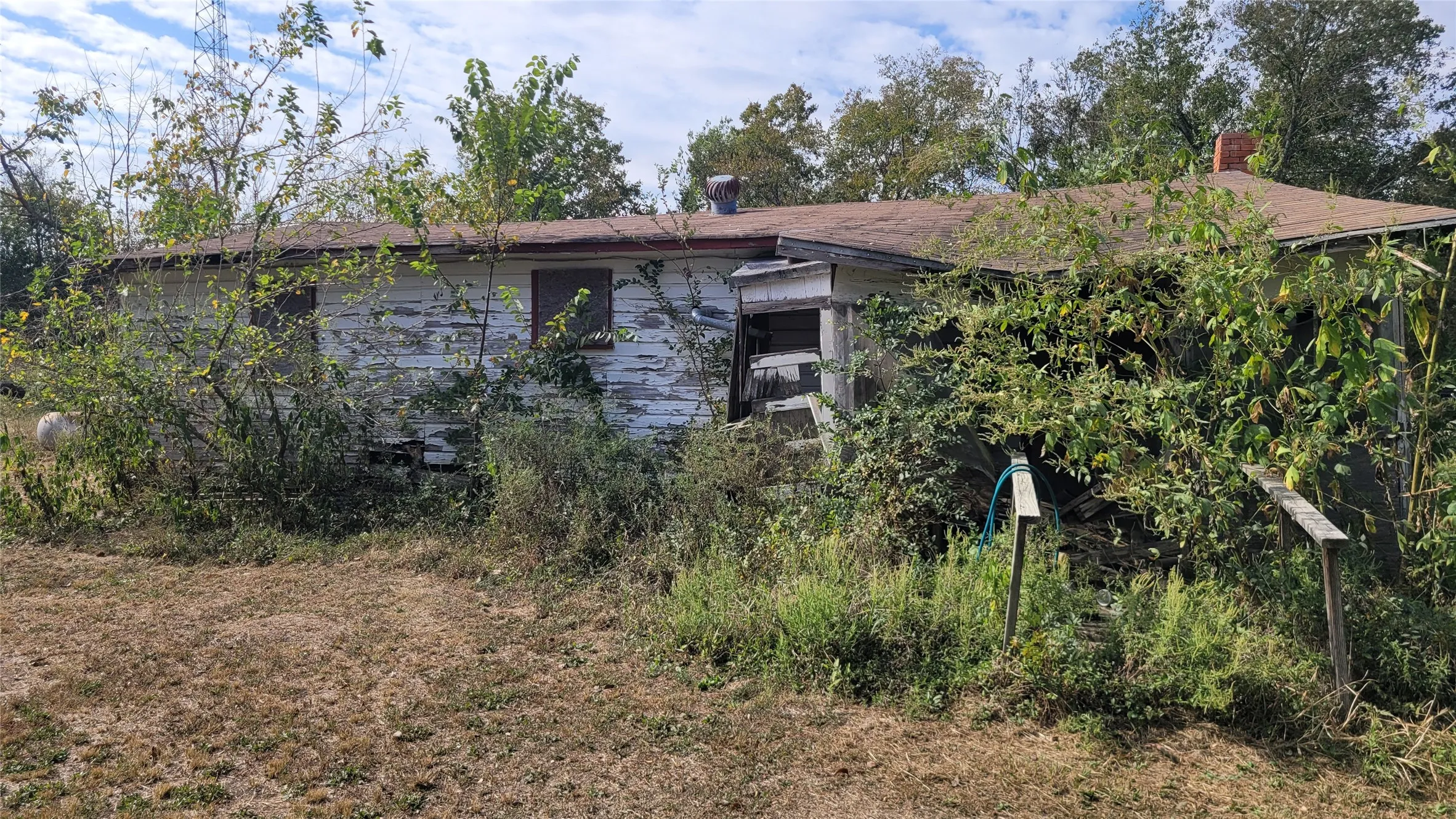 View of front of property with a chimney