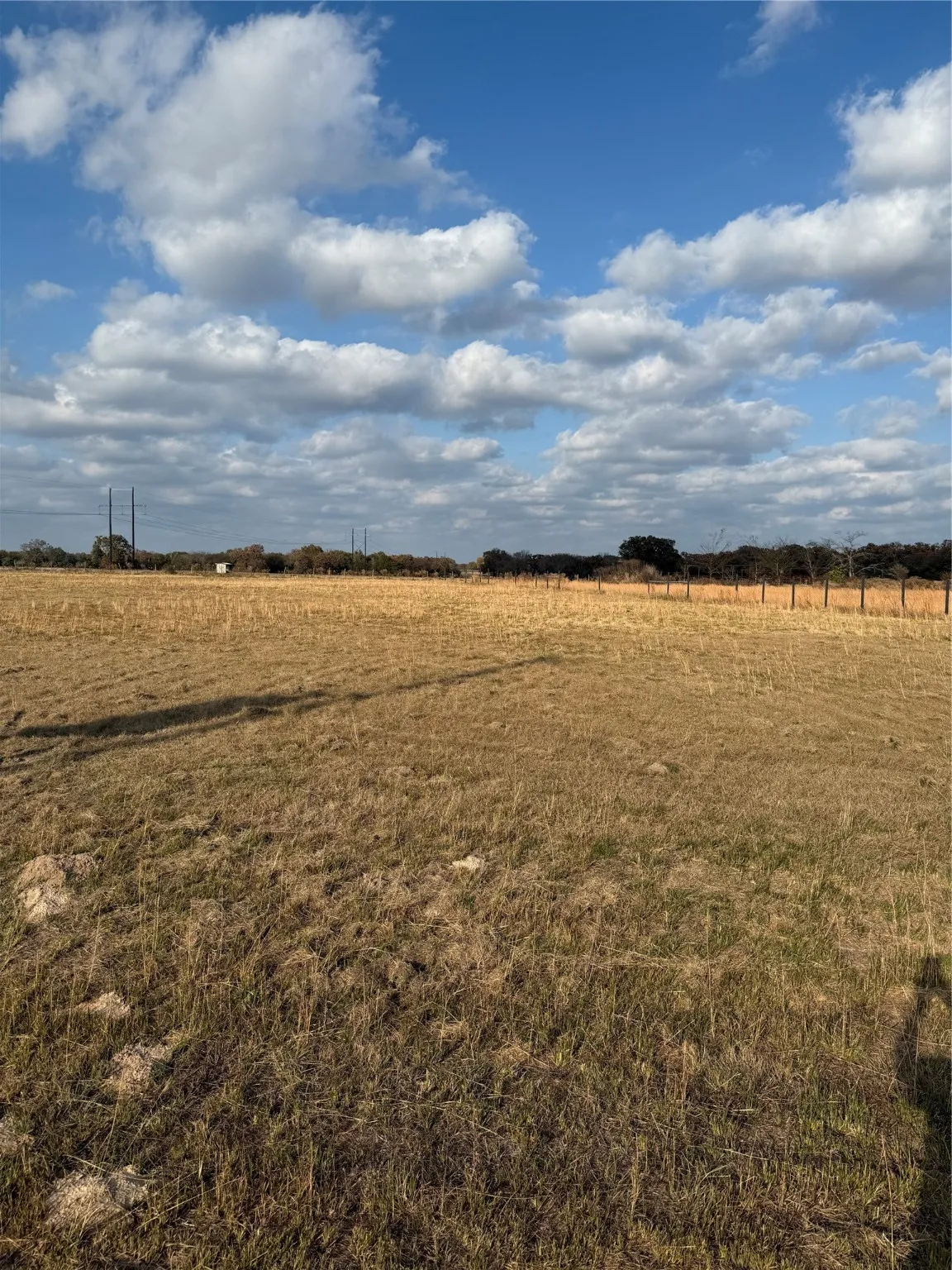 View of grassy yard with a view of countryside