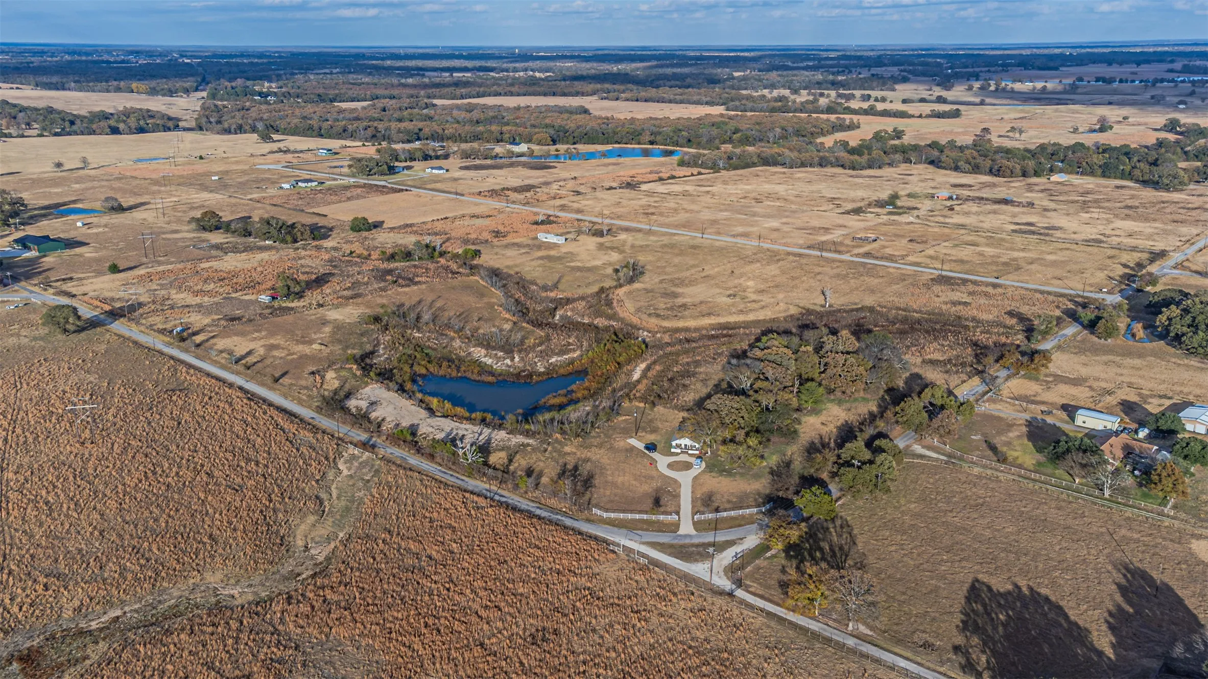View of property location featuring a large body of water and rural landscape